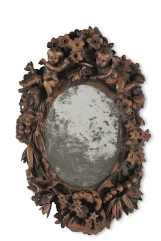 A SMALL CARVED SOFTWOOD MIRROR, POSSIBLY NORTH GERMAN, 18TH CENTURY