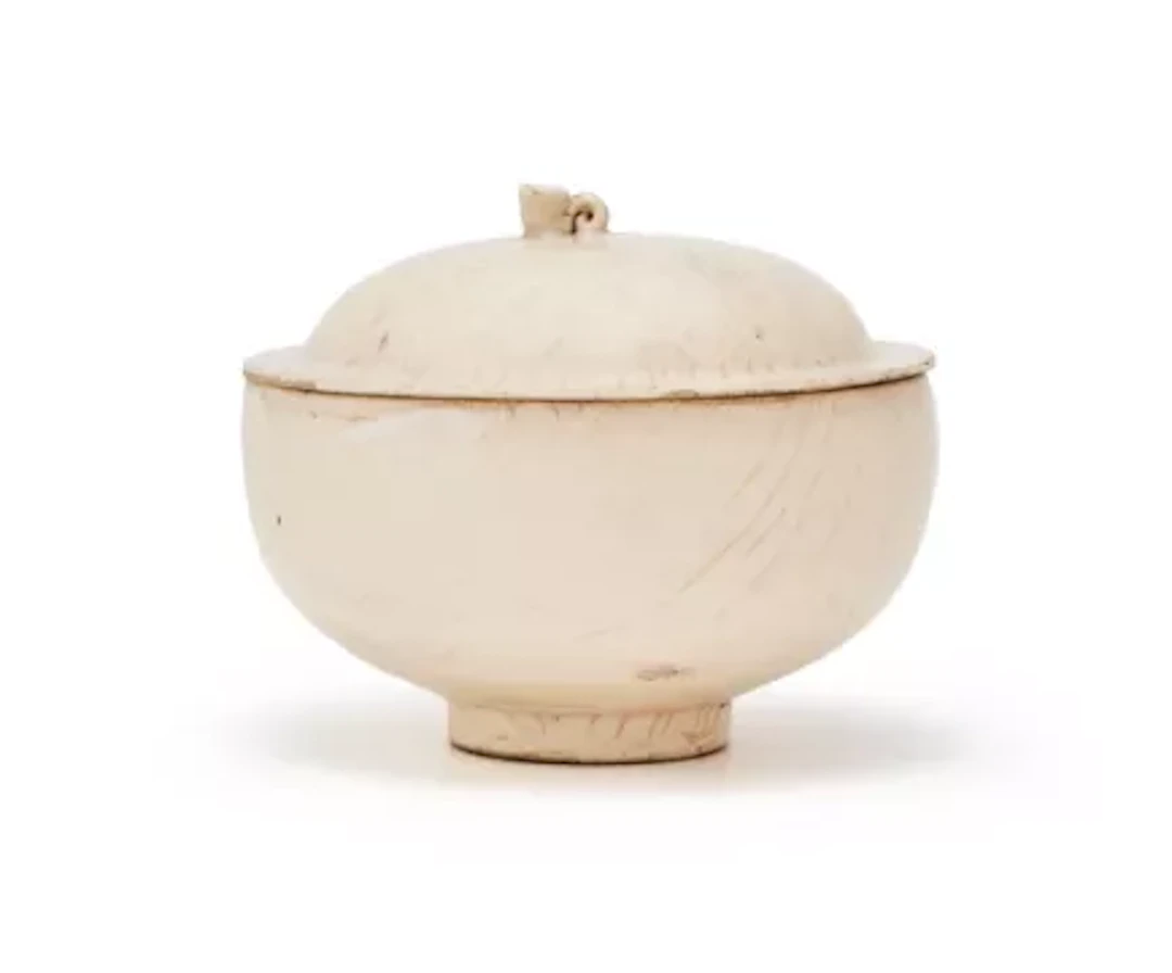 A Chinese Cizhou white glazed bowl and cover, Northern Song Dynasty (960-1127)