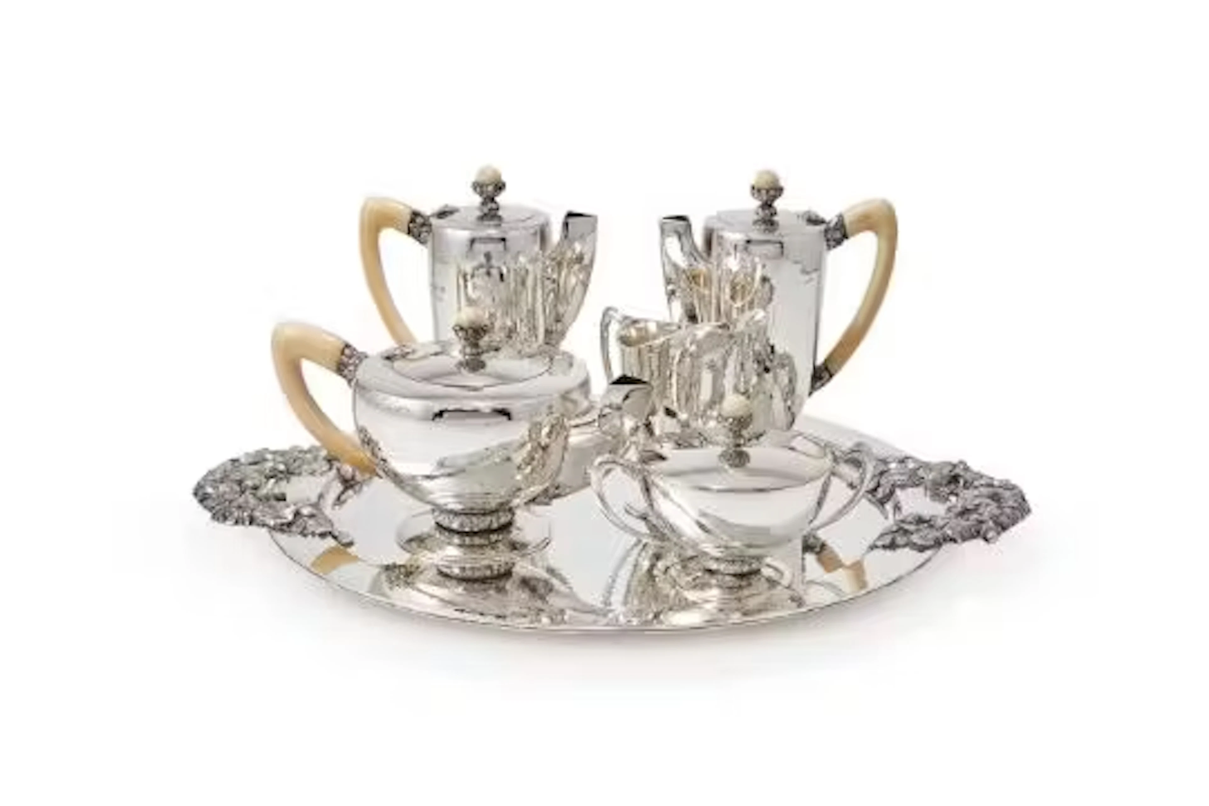 Y A SILVER SIX PIECE TEA AND COFFEE SET IN THE LATE ART DECO TASTE