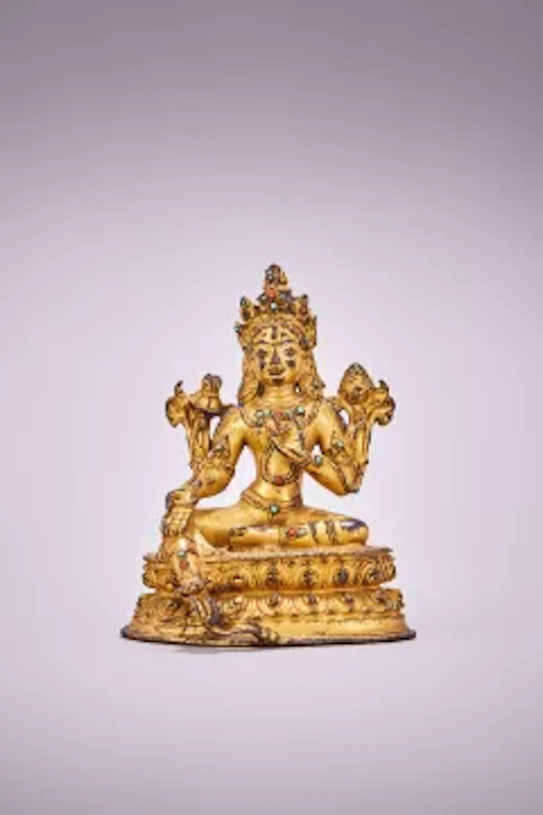 Y A Tibetan gilt copper alloy figure of Green Tara, 16th or 17th century