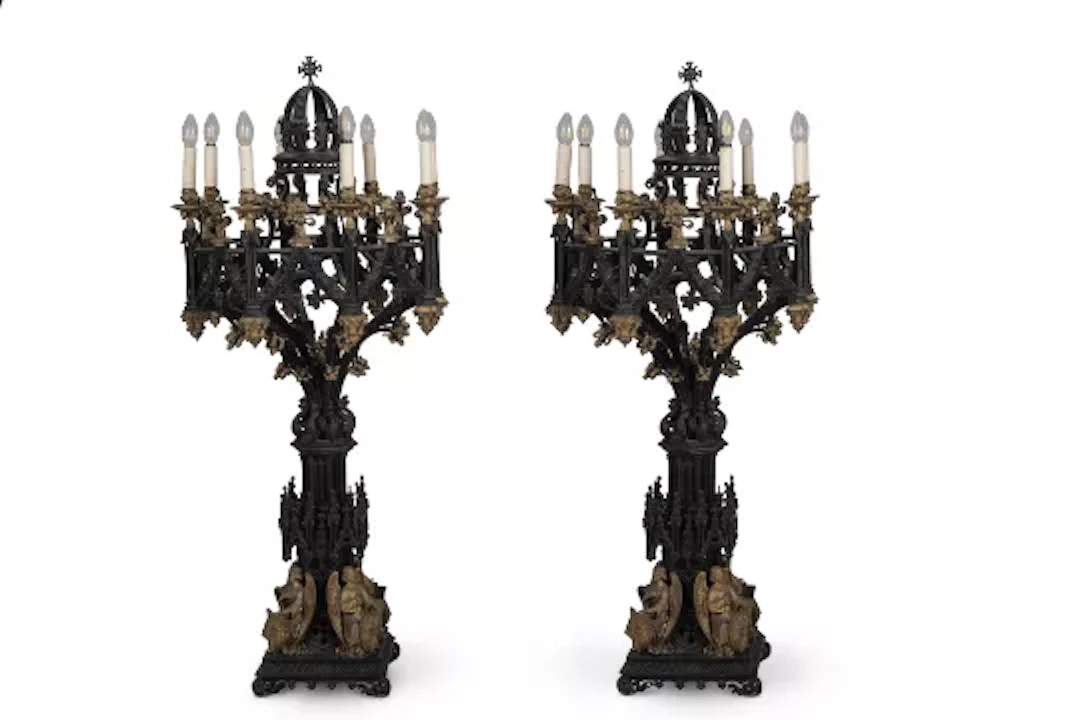 A LARGE PAIR OF BLACK AND GILT DECORATED BRONZE EIGHT LIGHT GOTHIC