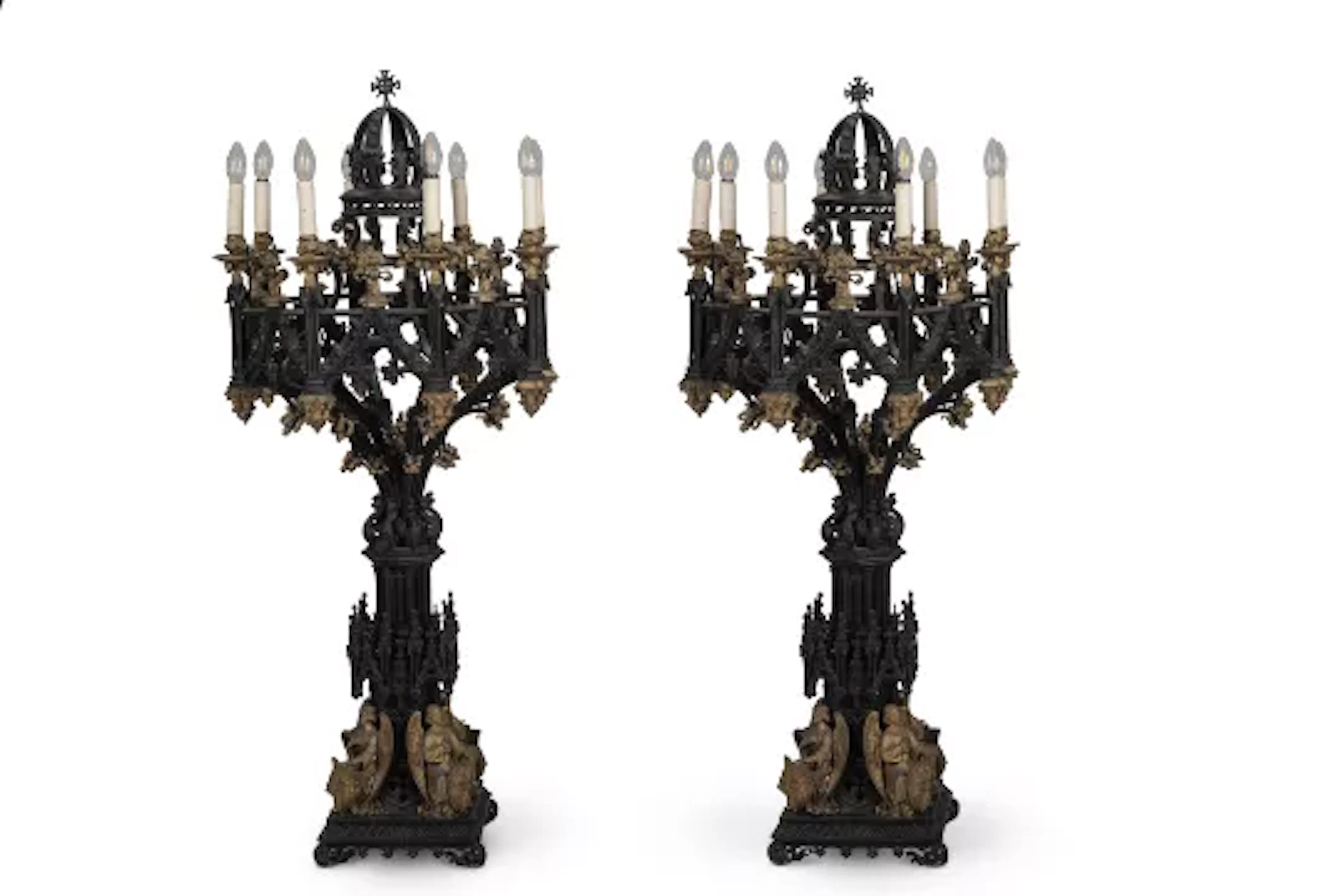 A LARGE PAIR OF BLACK AND GILT DECORATED BRONZE EIGHT LIGHT GOTHIC