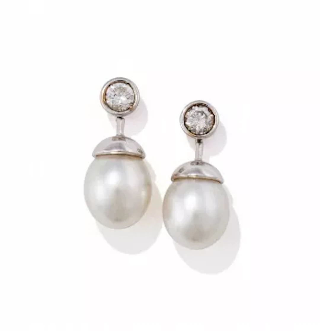 A PAIR OF CULTURED PEARL AND DIAMOND EARRINGS
