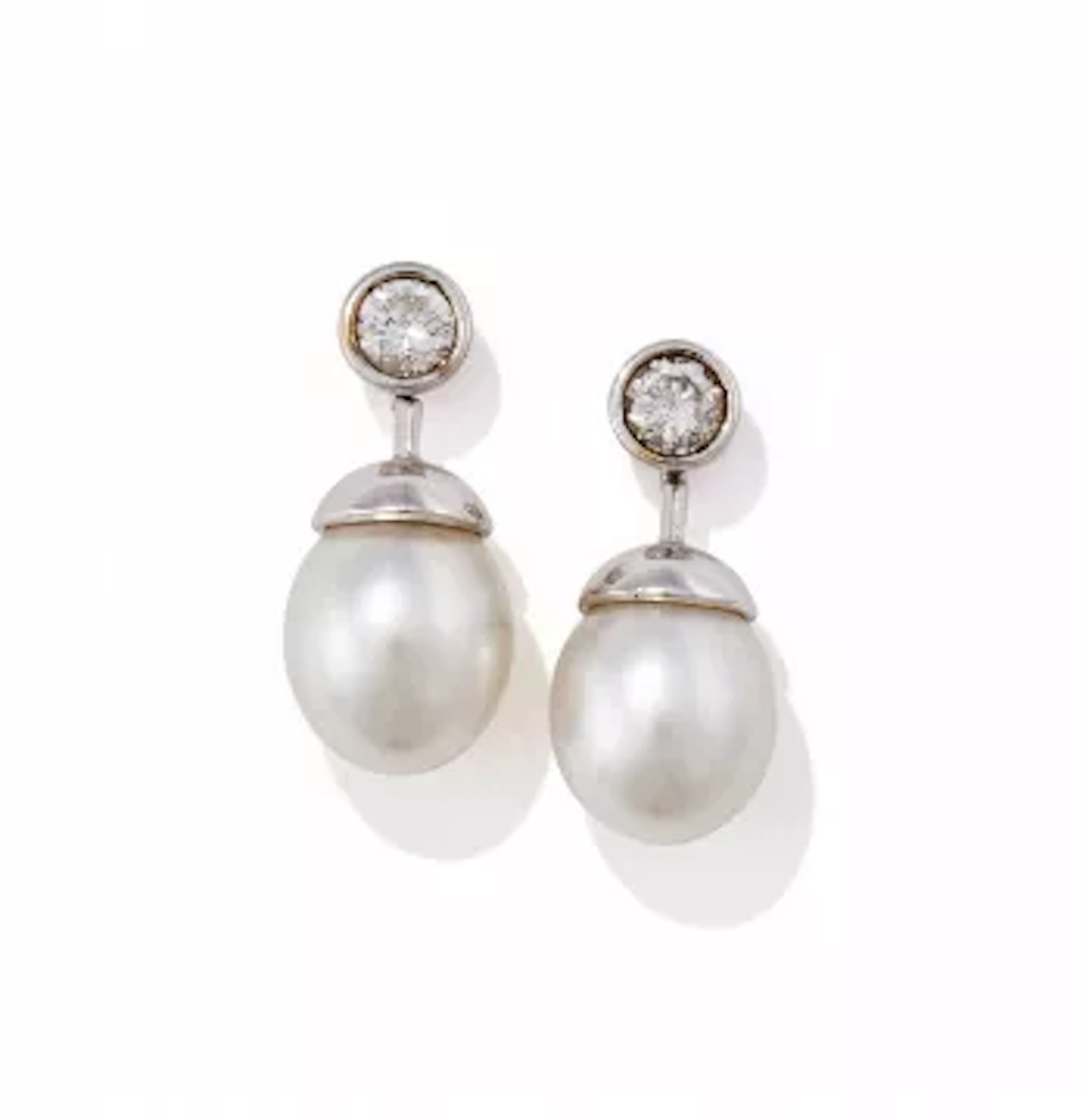 A PAIR OF CULTURED PEARL AND DIAMOND EARRINGS