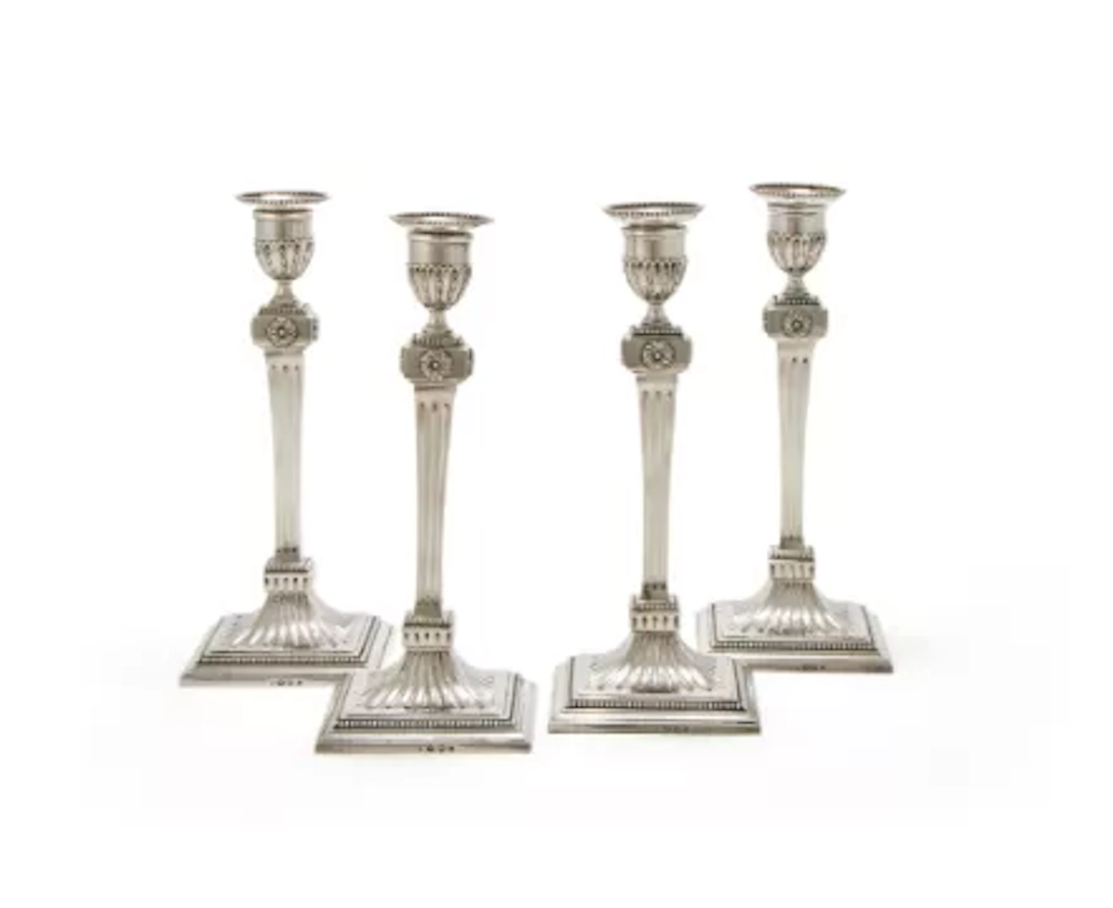 A SET OF FOUR DUTCH SILVER CANDLESTICKS, .833 STANDARD, 1933 (2) AND 1934 (2)
