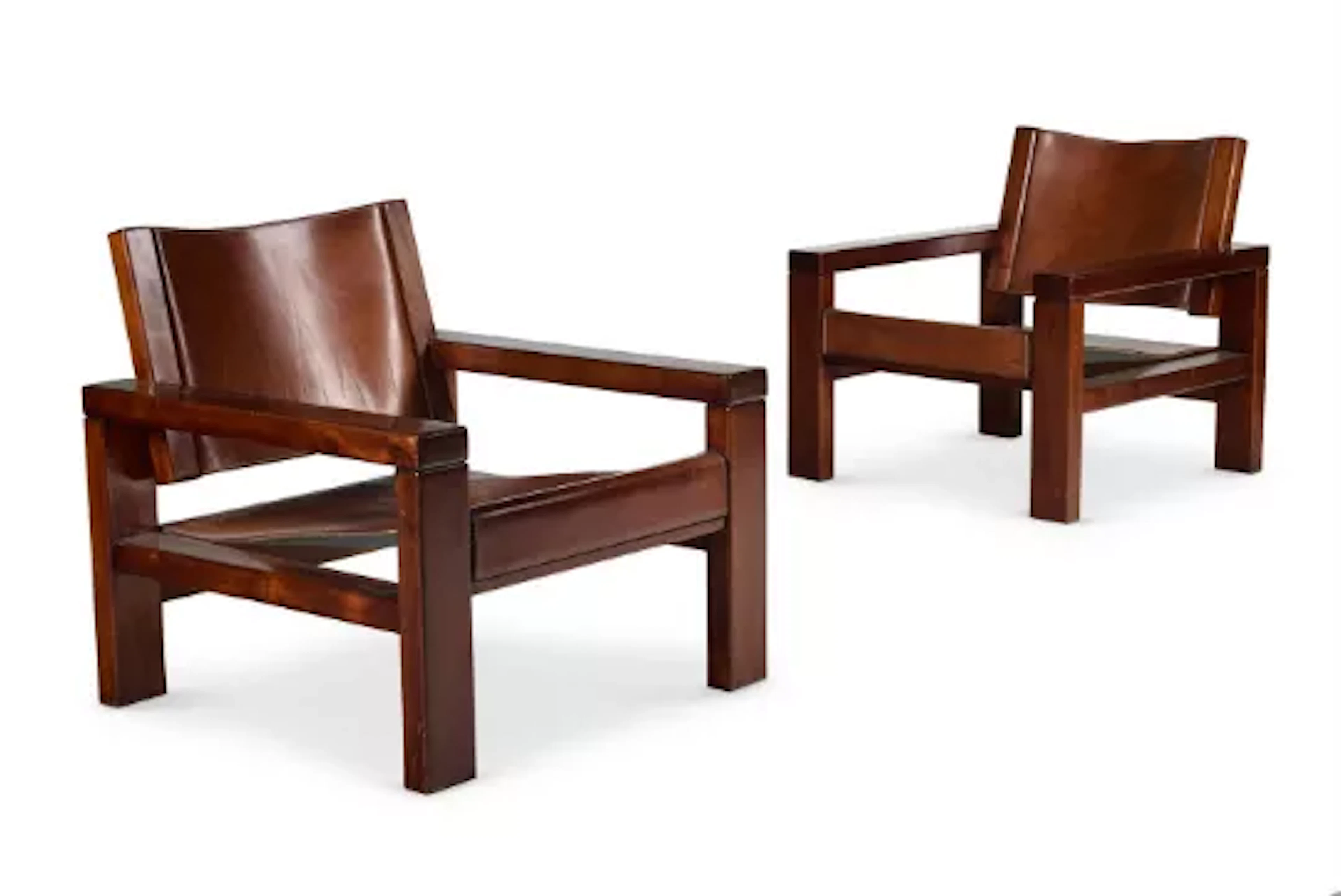 A PAIR OF MAHOGANY AND LEATHER ARMCHAIRS, ATTRIBUTED TO PIERRE CHAPO