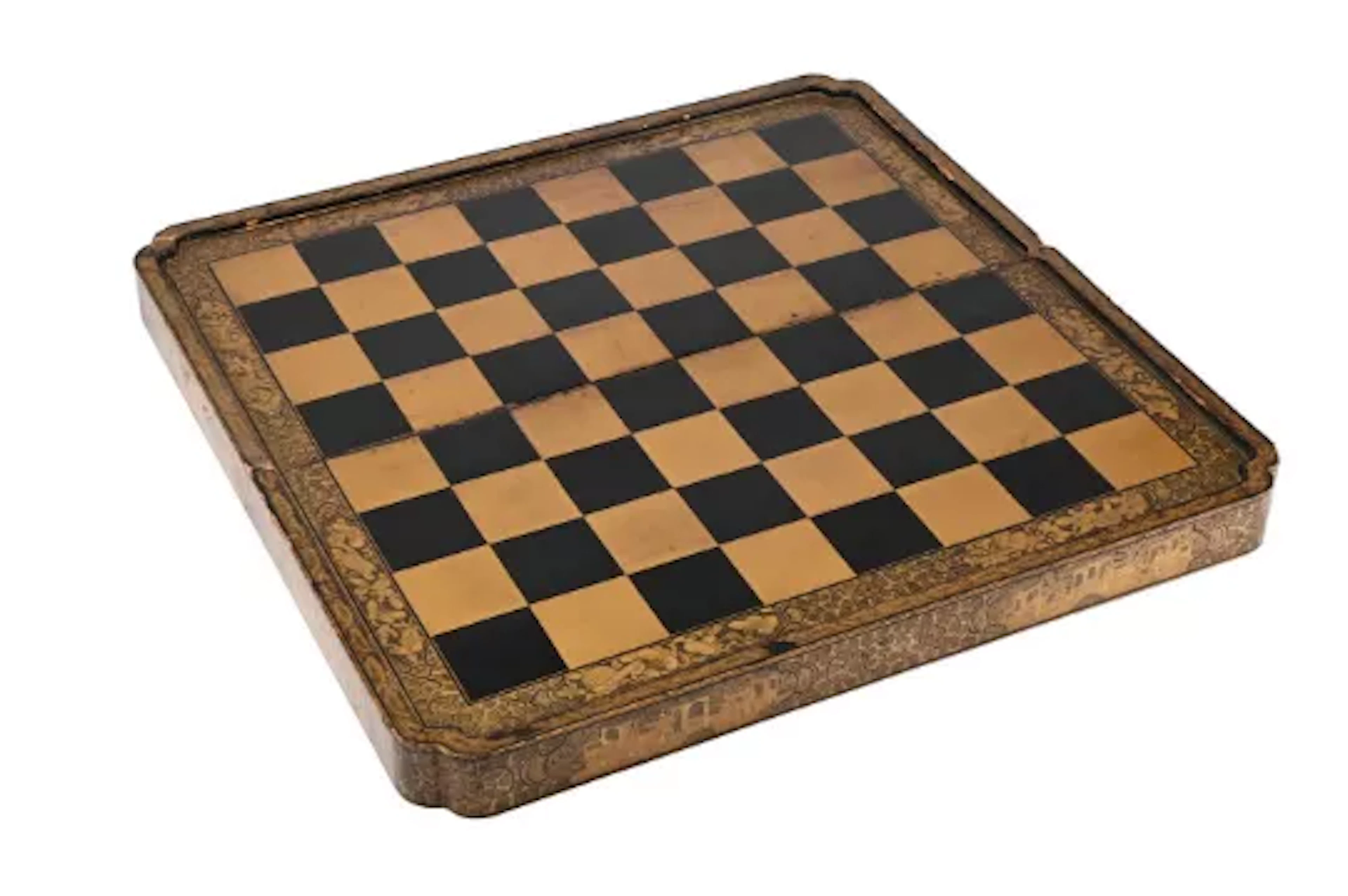 A CHINESE EXPORT BLACK AND GOLD LACQUER CHESS AND BACKGAMMON BOARD