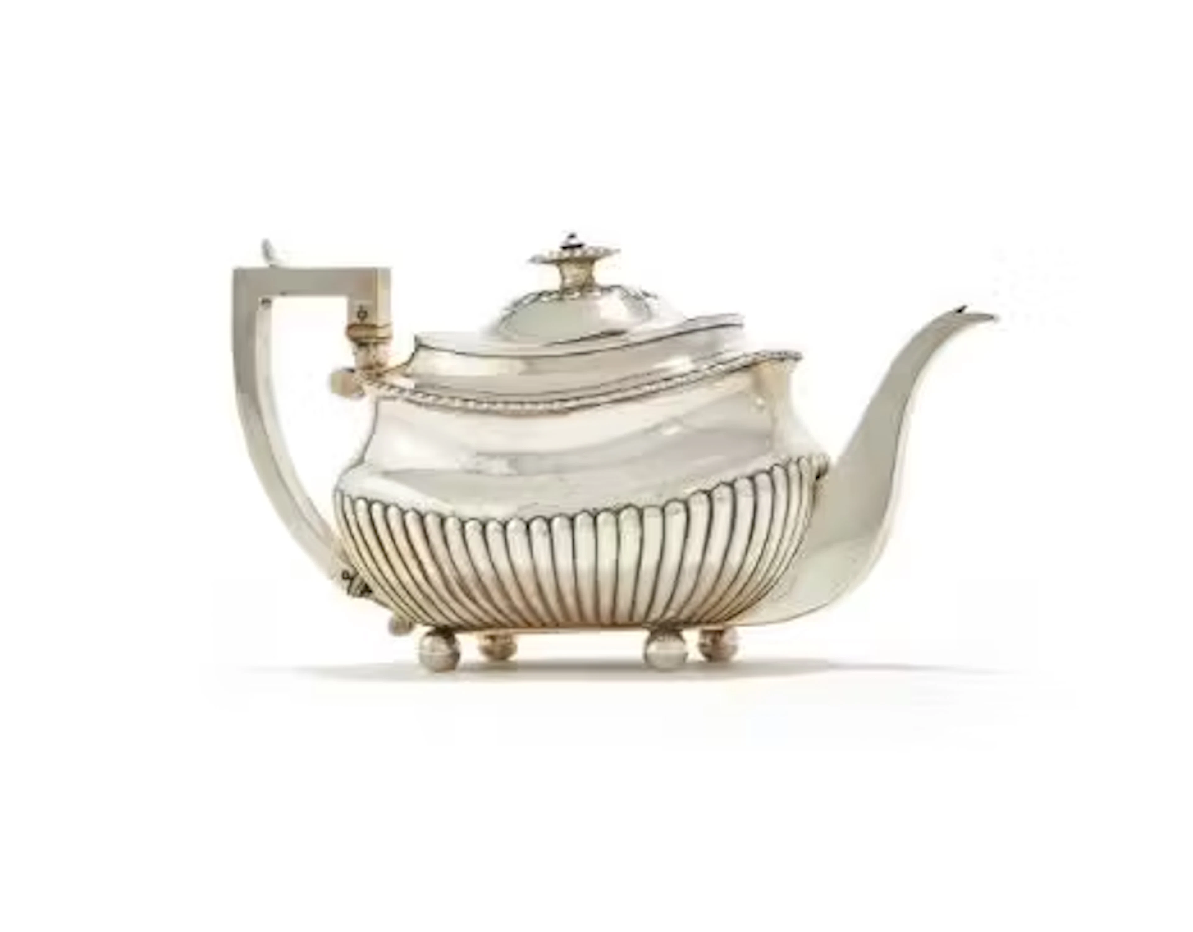 Y A GEORGE III SILVER LOBED OBLONG BALUSTER TEA POT