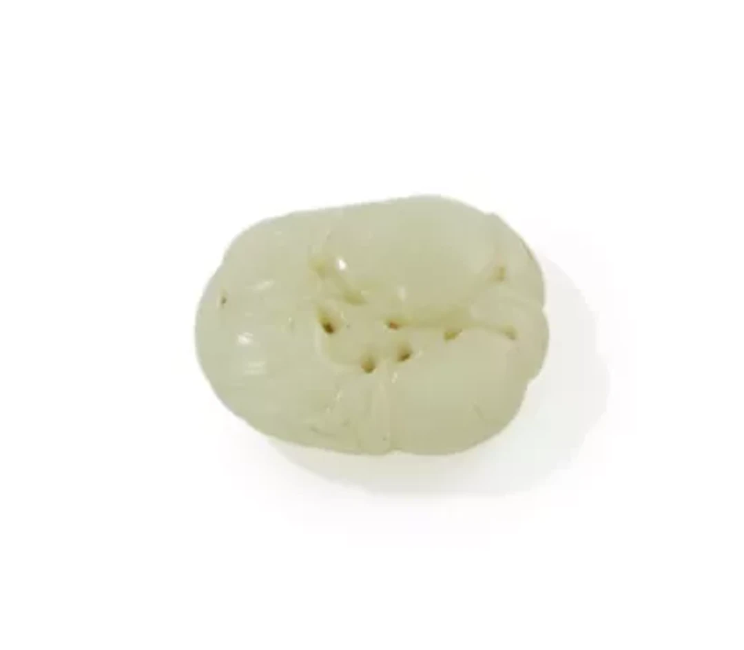 A Chinese pale celadon jade 'Bat and peach' pendant, 18th century