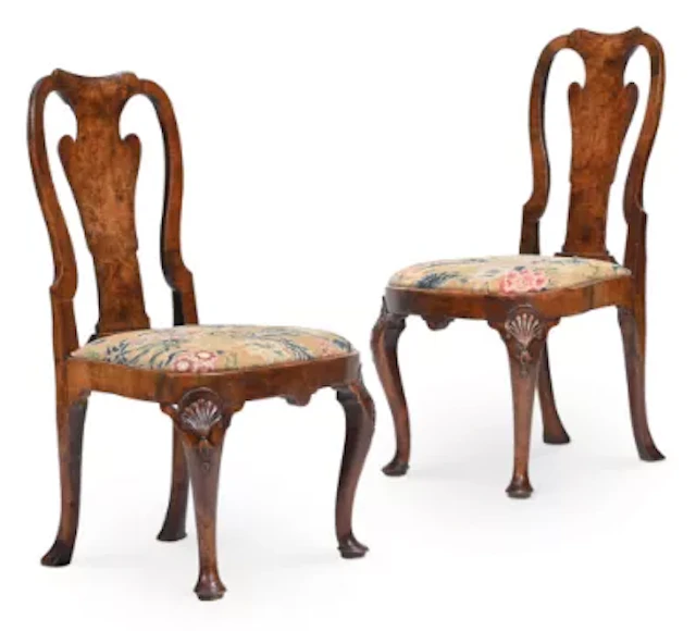 A PAIR OF GEORGE I BURR WALNUT AND NEEDLEWORK UPHOLSTERED SIDE CHAIRS