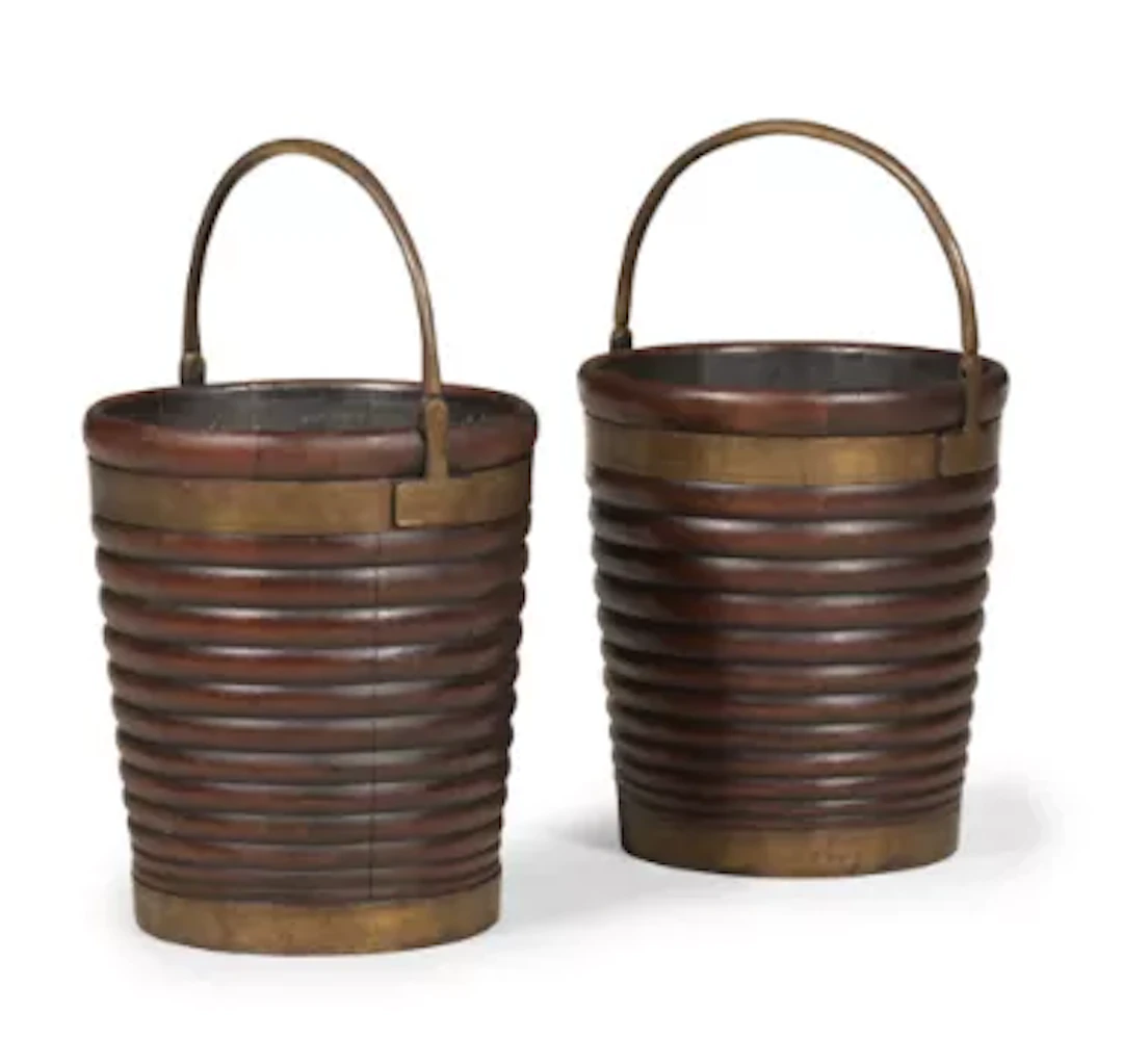 A PAIR OF GEORGE III MAHOGANY AND BRASS BOUND BUCKETS, IRISH, CIRCA 1780