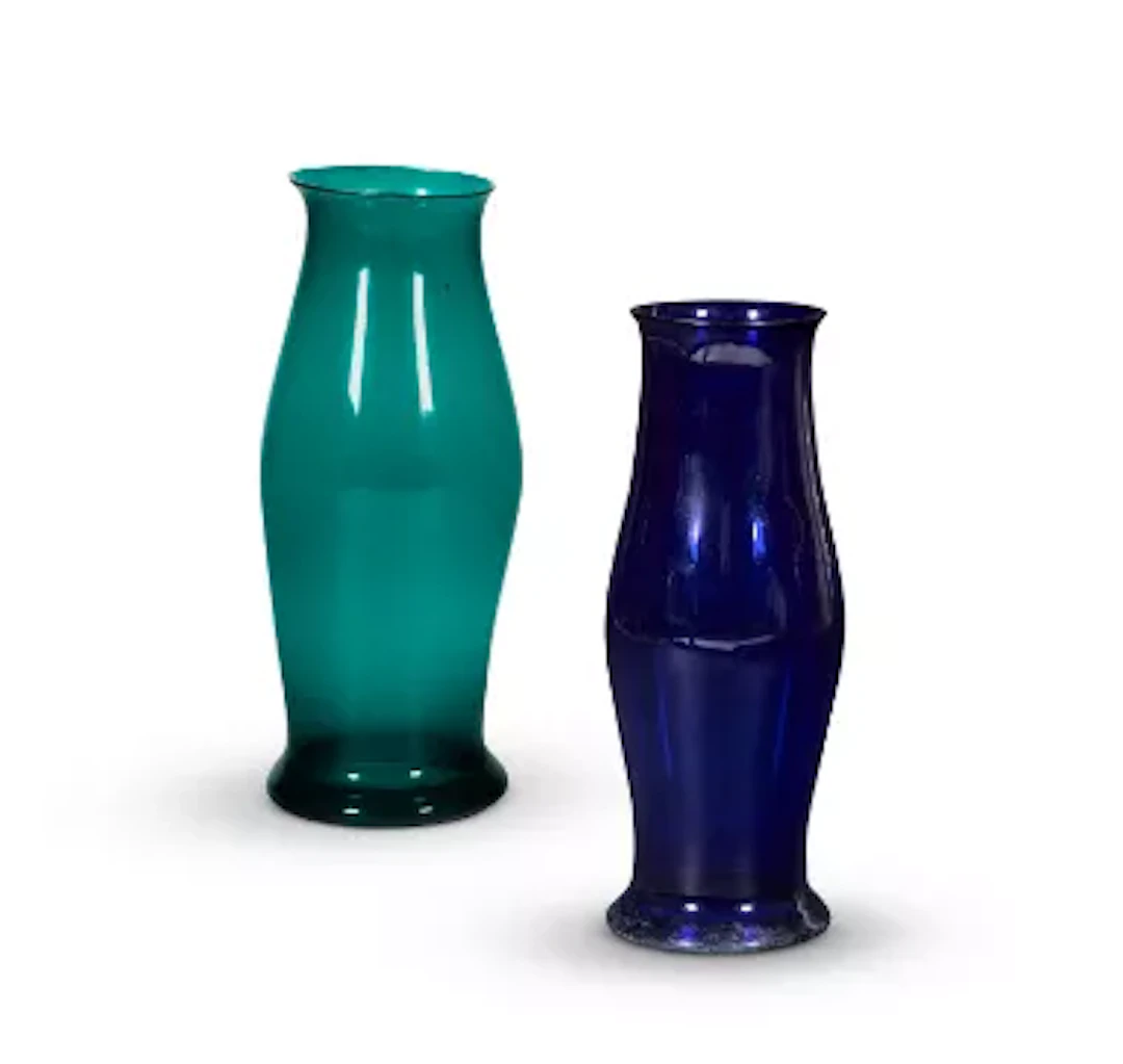 TWO COLOURED GLASS STORM BALUSTER STORM SHADES, INDIAN, LATE 19TH CENTURY