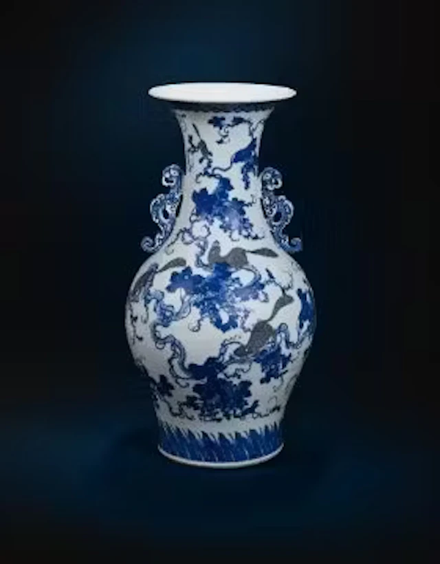 A large Chinese underglaze blue and copper red twin handled vase