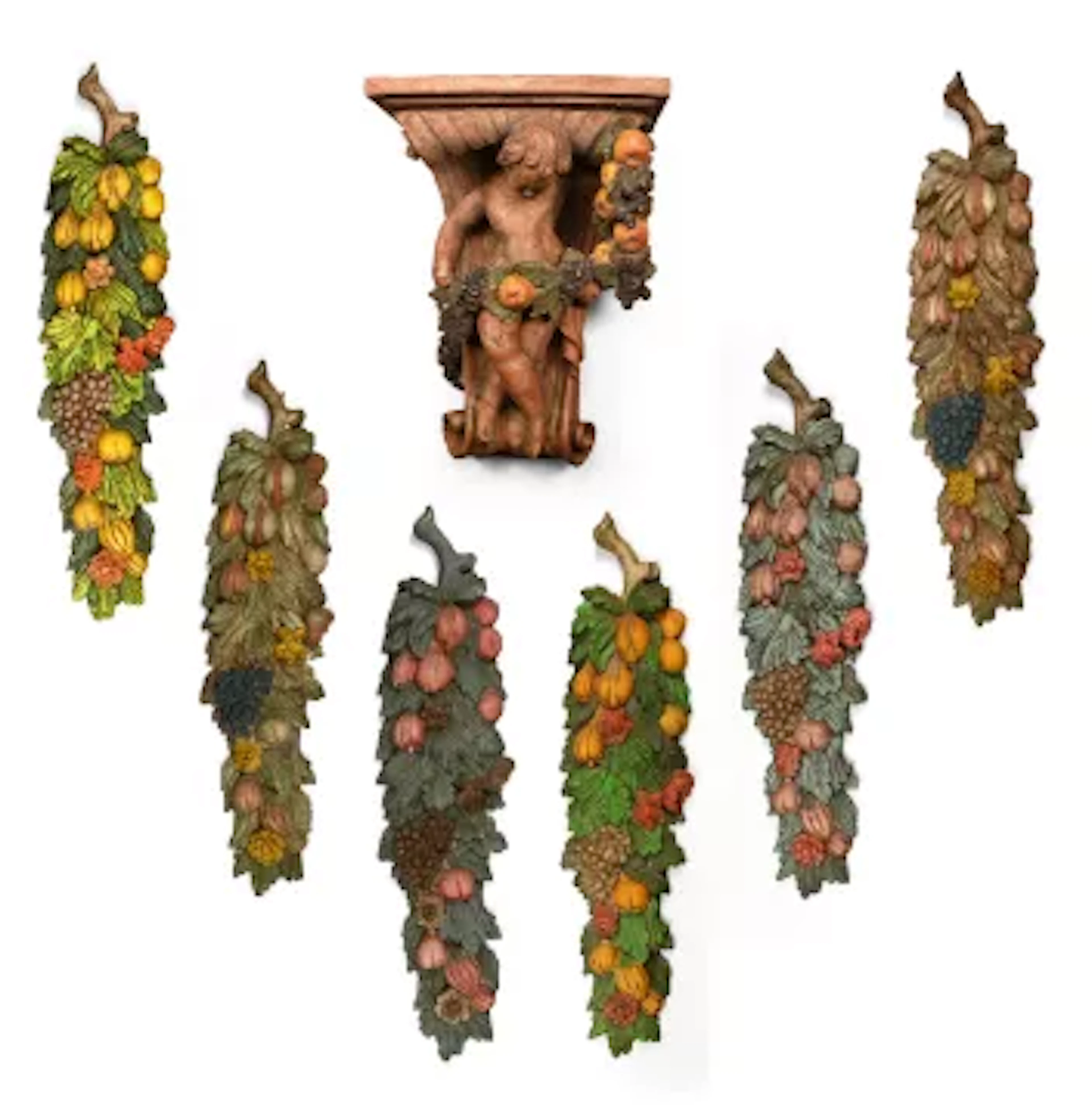 SIX PAINTED COMPOSITION WALL APPLIQUES, 20TH CENTURY, AND A WOOD NYMPH