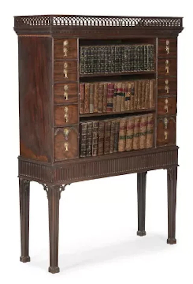 AN UNUSUAL GEORGE III MAHOGANY OPEN BOOKCASE ON STAND, CIRCA 1790