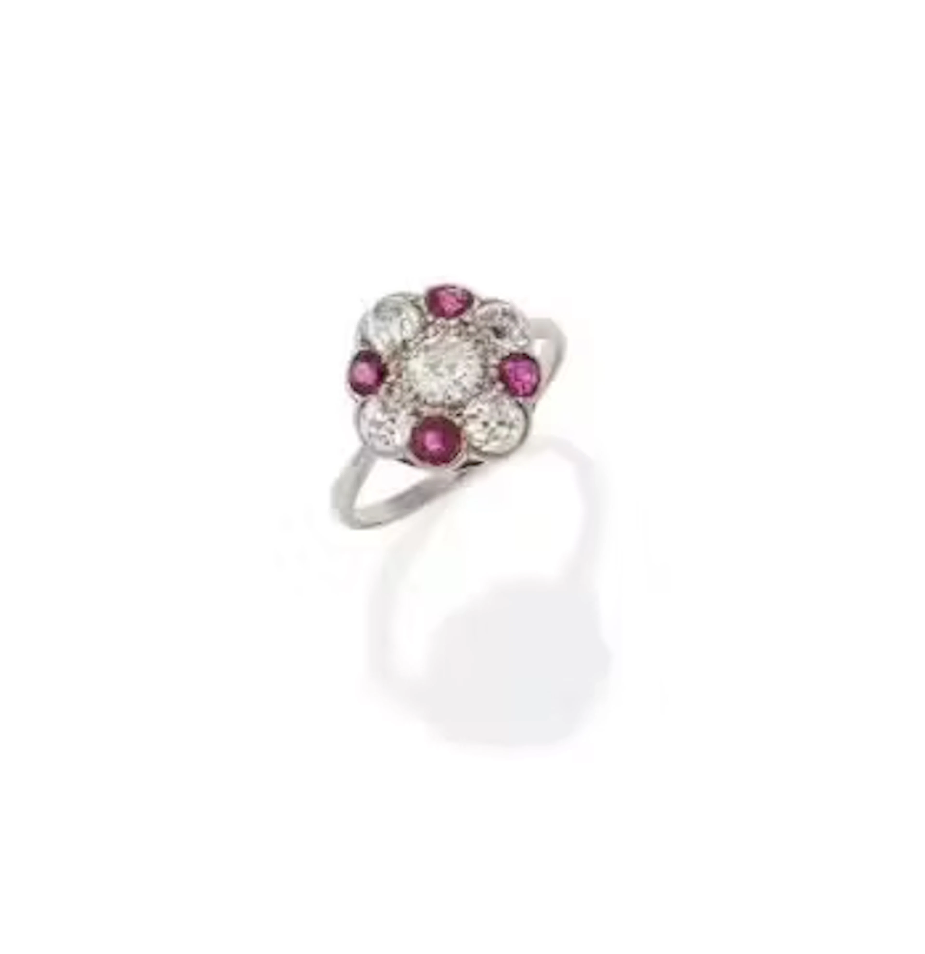 A RUBY AND DIAMOND CLUSTER RING