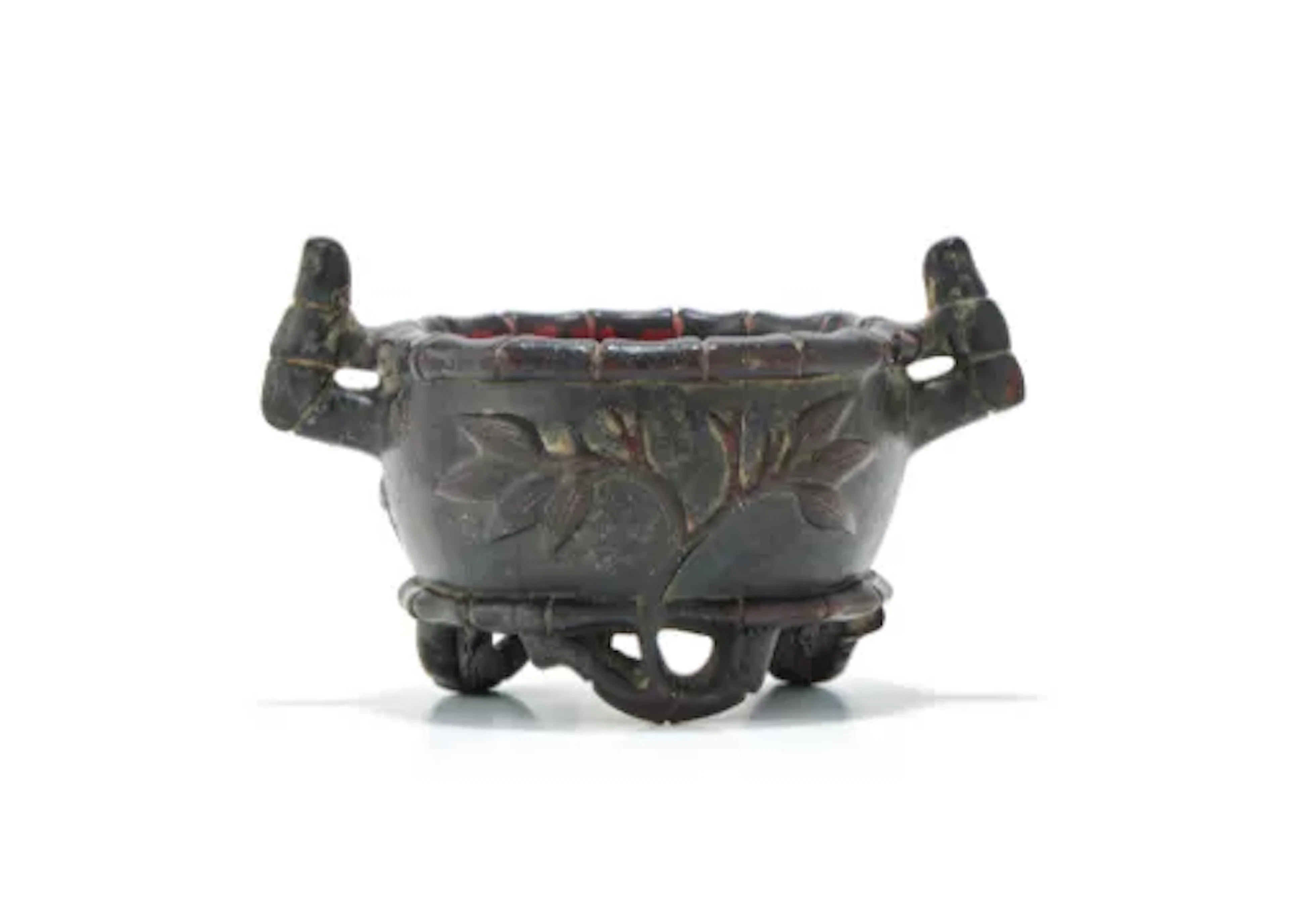 A Chinese lacquered bamboo carved tripod censer, Qing Dynasty