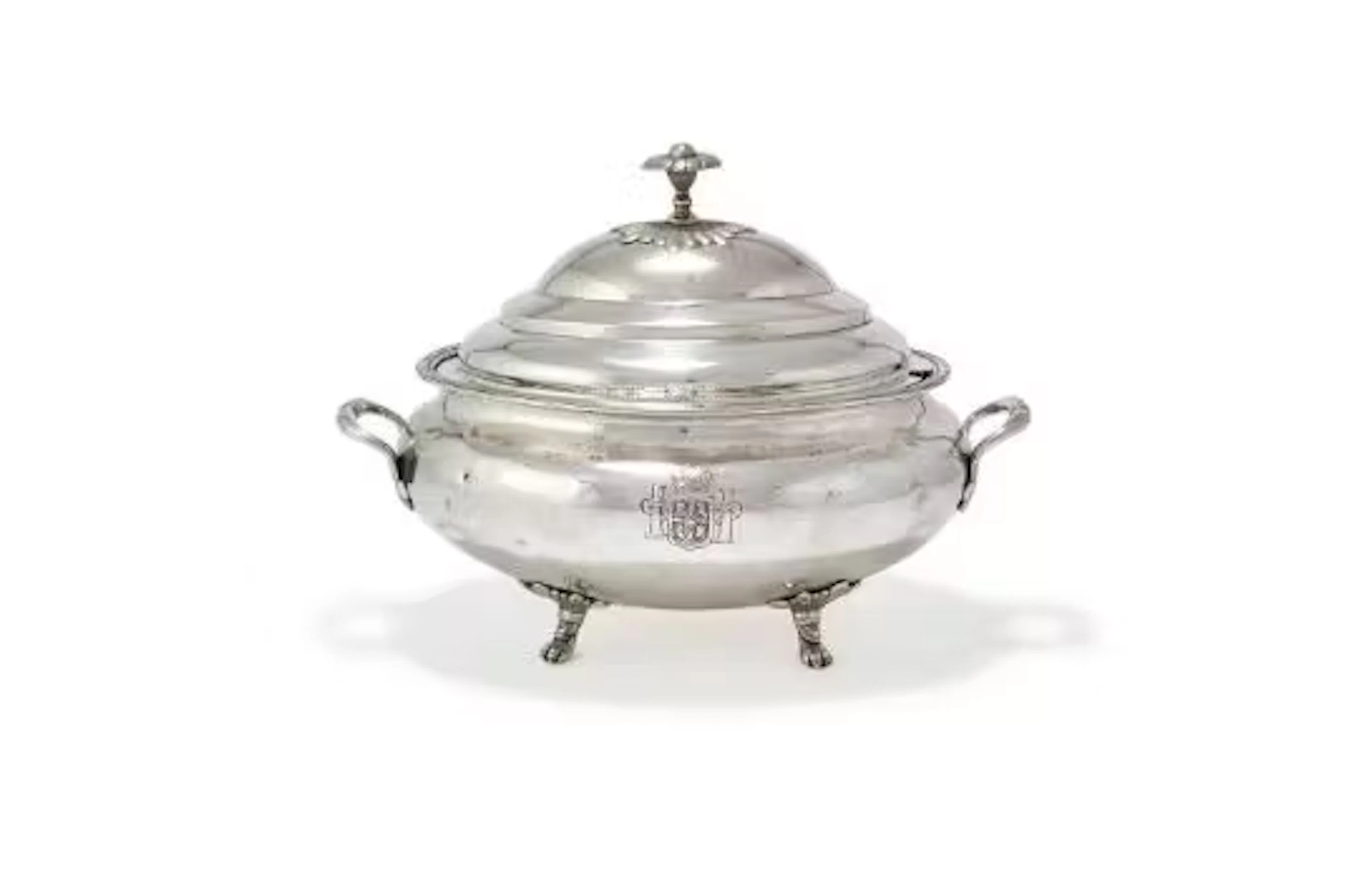 A SOUTH AMERICAN SILVER COLOURED OVAL TUREEN AND COVER