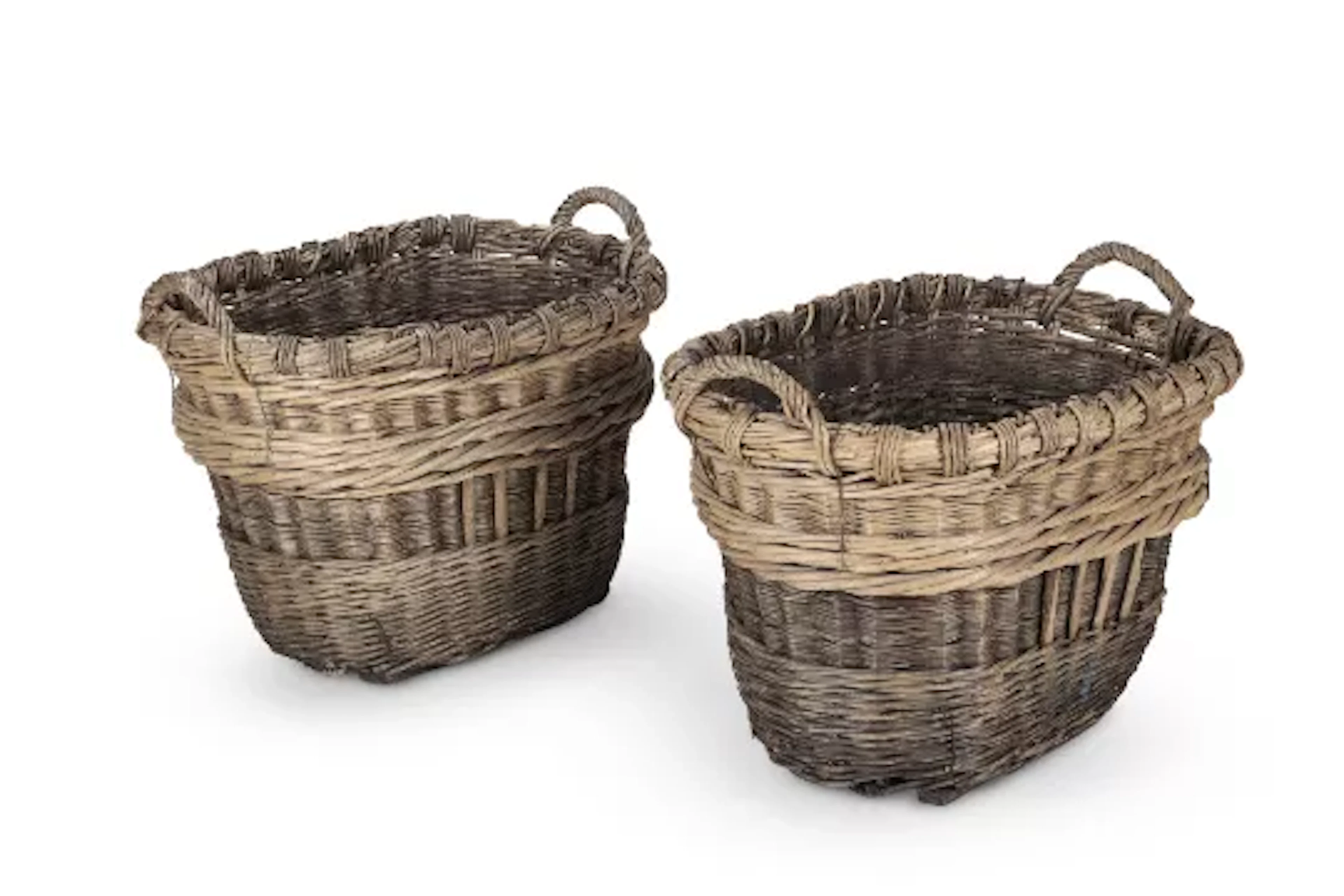 A LARGE PAIR OF OVAL WICKER LOG BASKETS, 20TH CENTURY