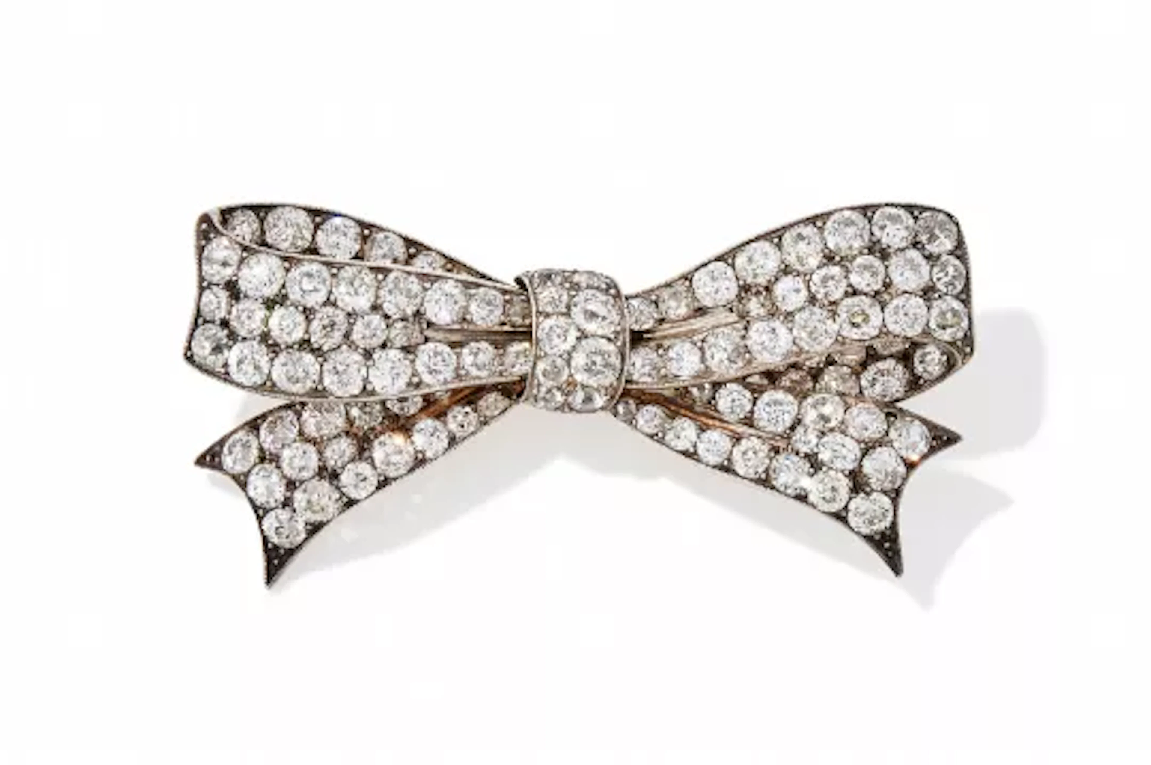 A LATE 19TH CENTURY DIAMOND BOW BROOCH