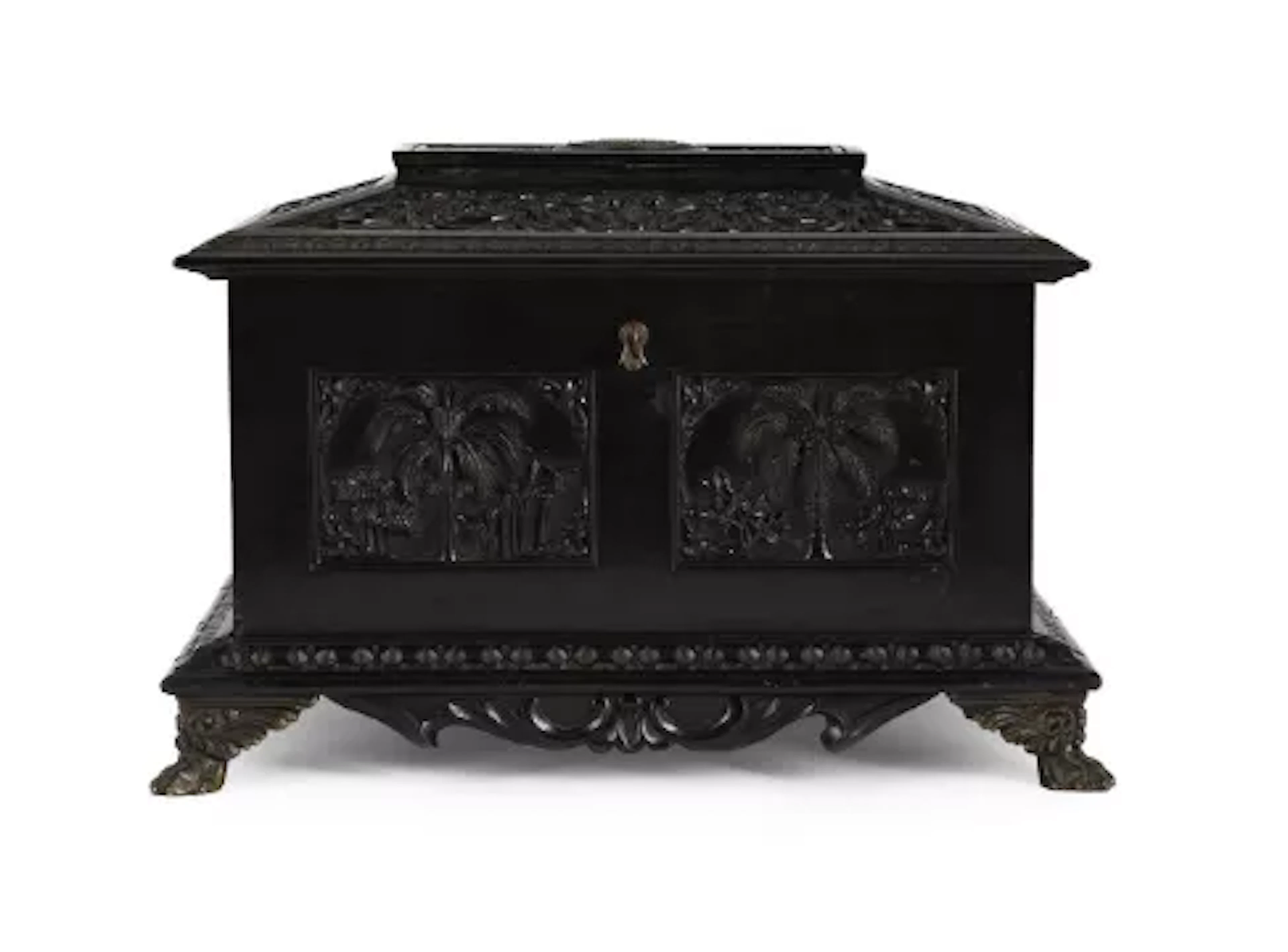 Y A CEYLONESE CARVED EBONY AND EBONISED BOX, BY DON ANDRIS COLOMBO