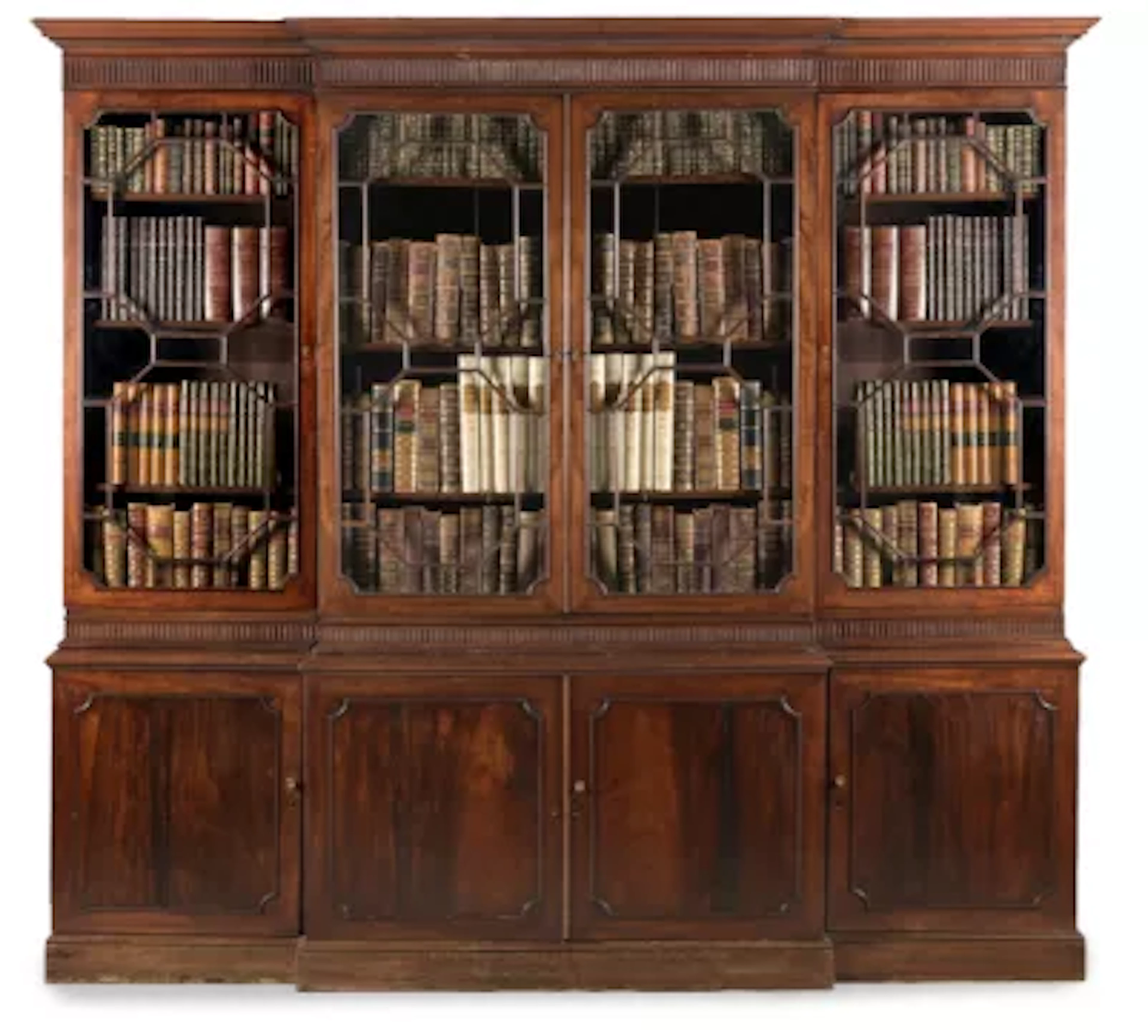 A GEORGE III MAHOGANY BREAKFRONT LIBRARY BOOKCASE, CIRCA 1780