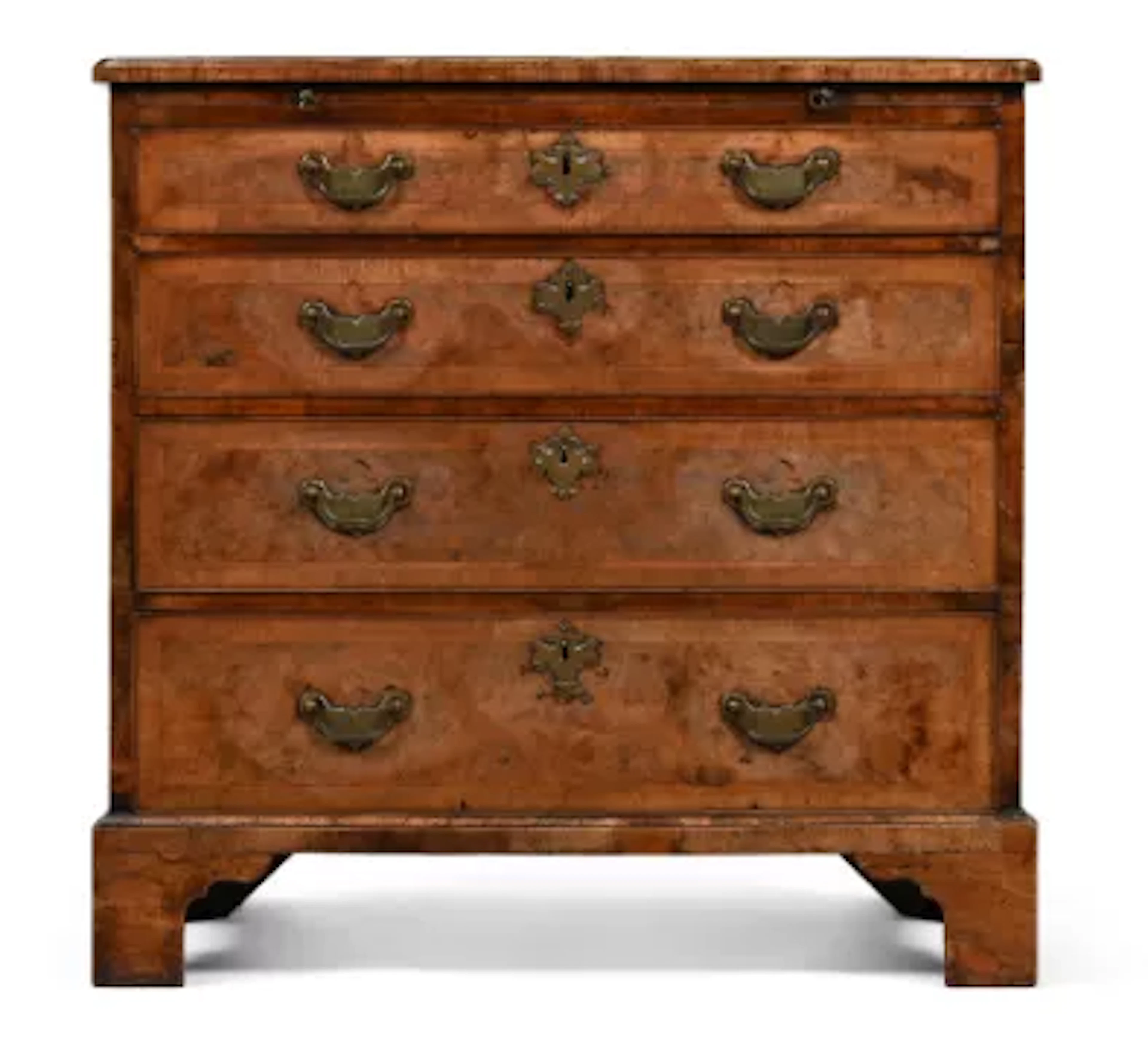 A GEORGE II WALNUT AND FEATHERBANDED BACHELOR'S CHEST OF DRAWERS, CIRCA 1735
