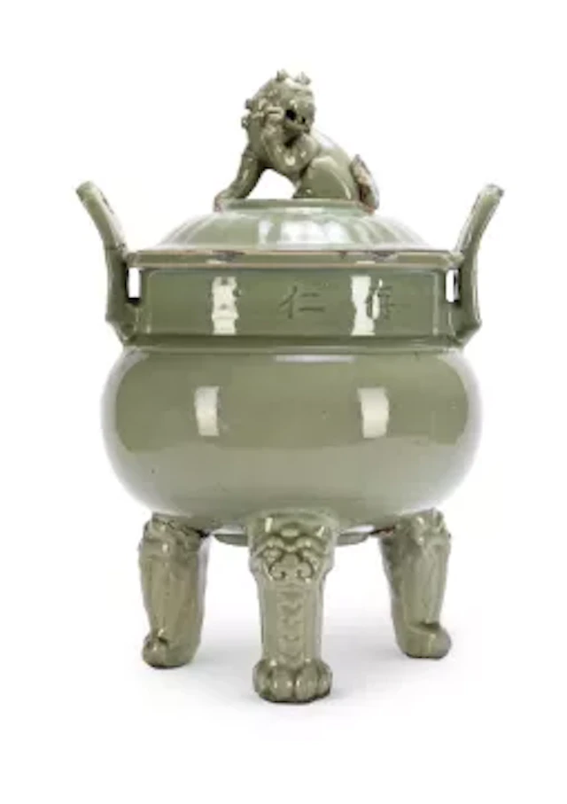A large and unusual Chinese Longquan celadon inscribed tripod censer