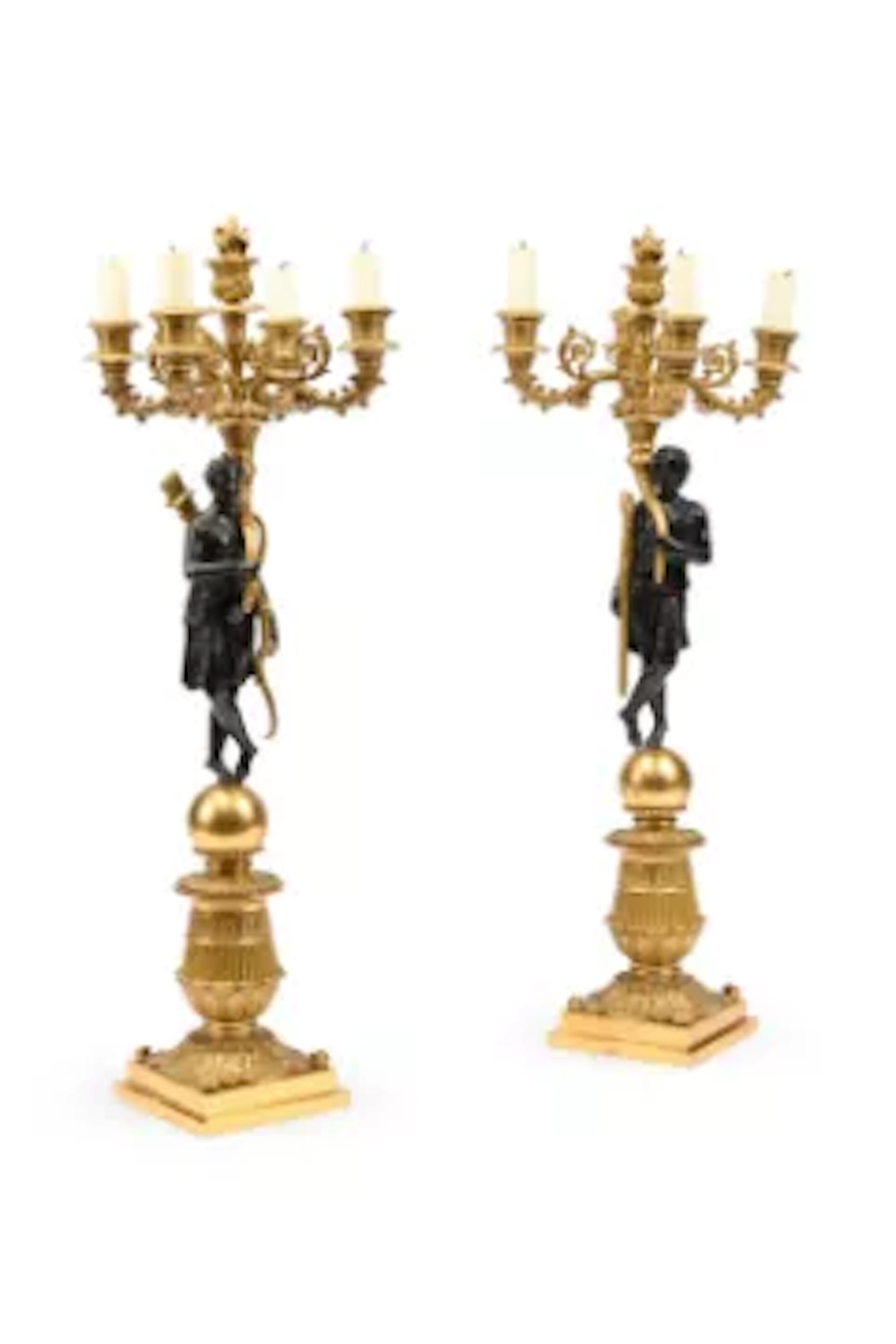 AFTER PIERRE-PHILIPPE THOMIRE, A PAIR OF EMPIRE GILT AND PATINATED