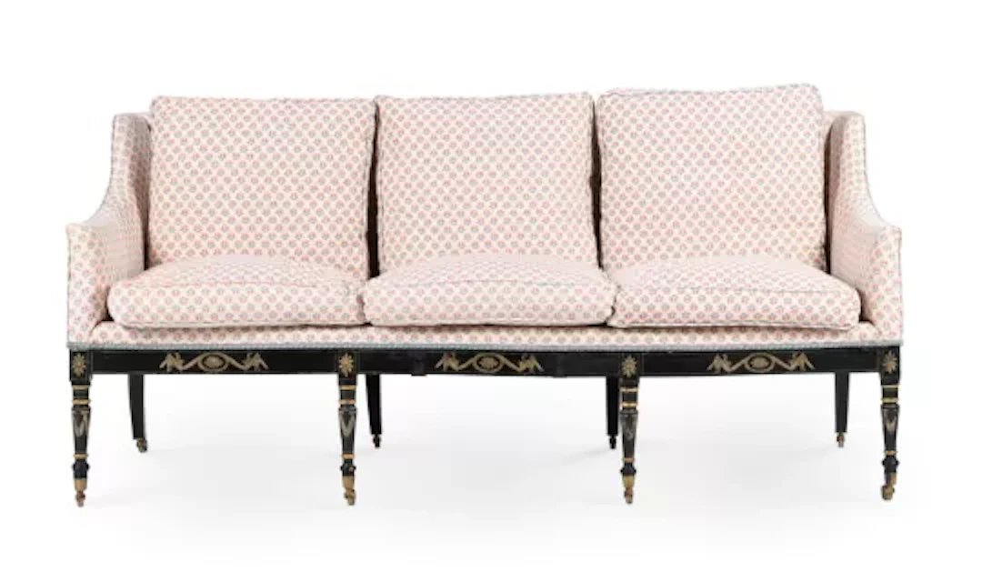 A GEORGE III EBONISED, PAINTED AND FLORAL UPHOLSTERED SETTEE, CIRCA 1810