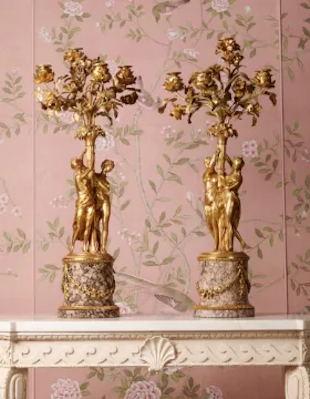 A PAIR OF FRENCH ORMOLU FOUR BRANCH CANDELABRA, IN THE MANNER OF FALCONET