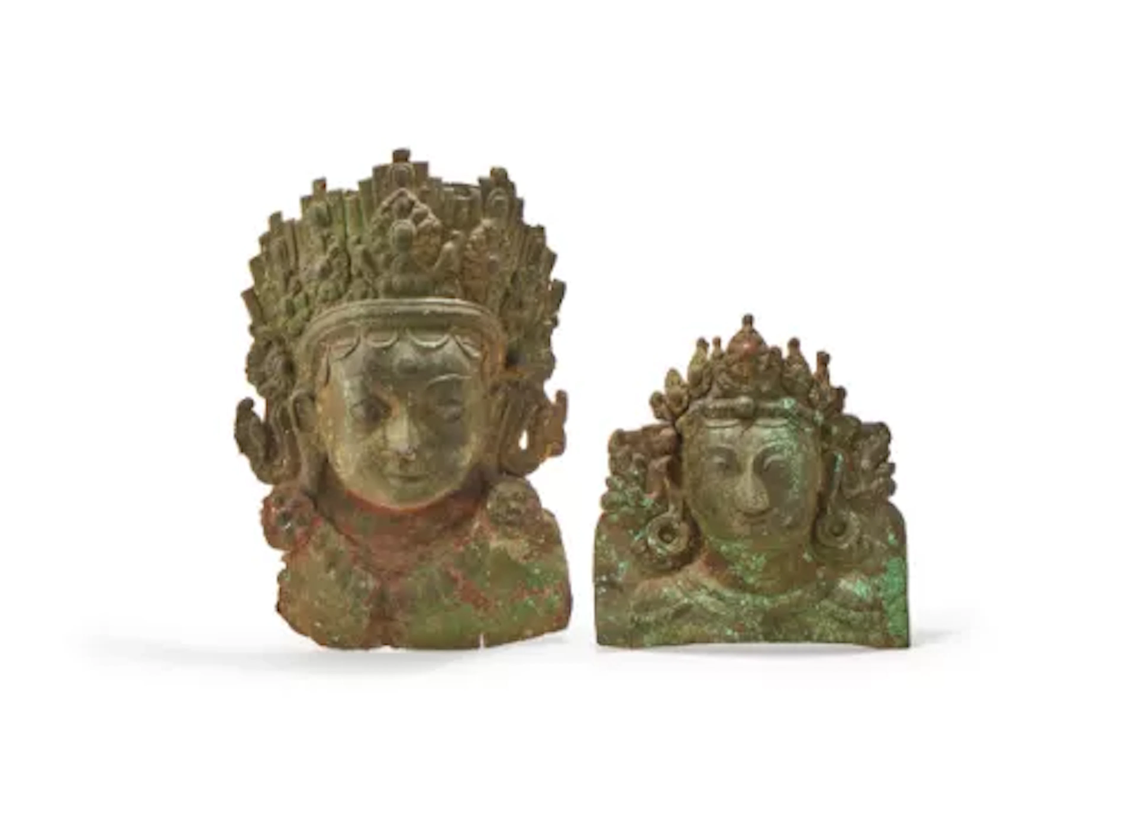 Two copper repousse masks, Nepal, possibly 17th century