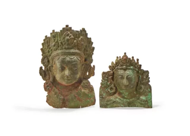 Two copper repousse masks, Nepal, possibly 17th century