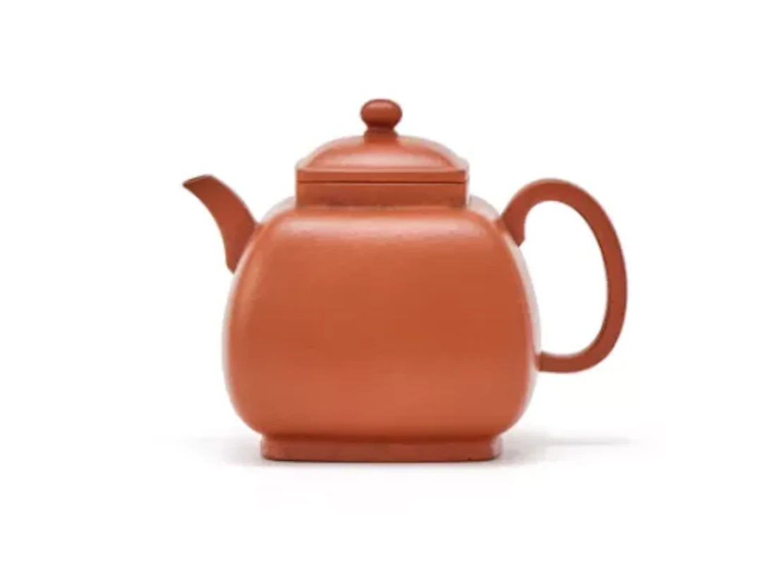 A small Chinese yixing inscribed teapot, Qing Dynasty