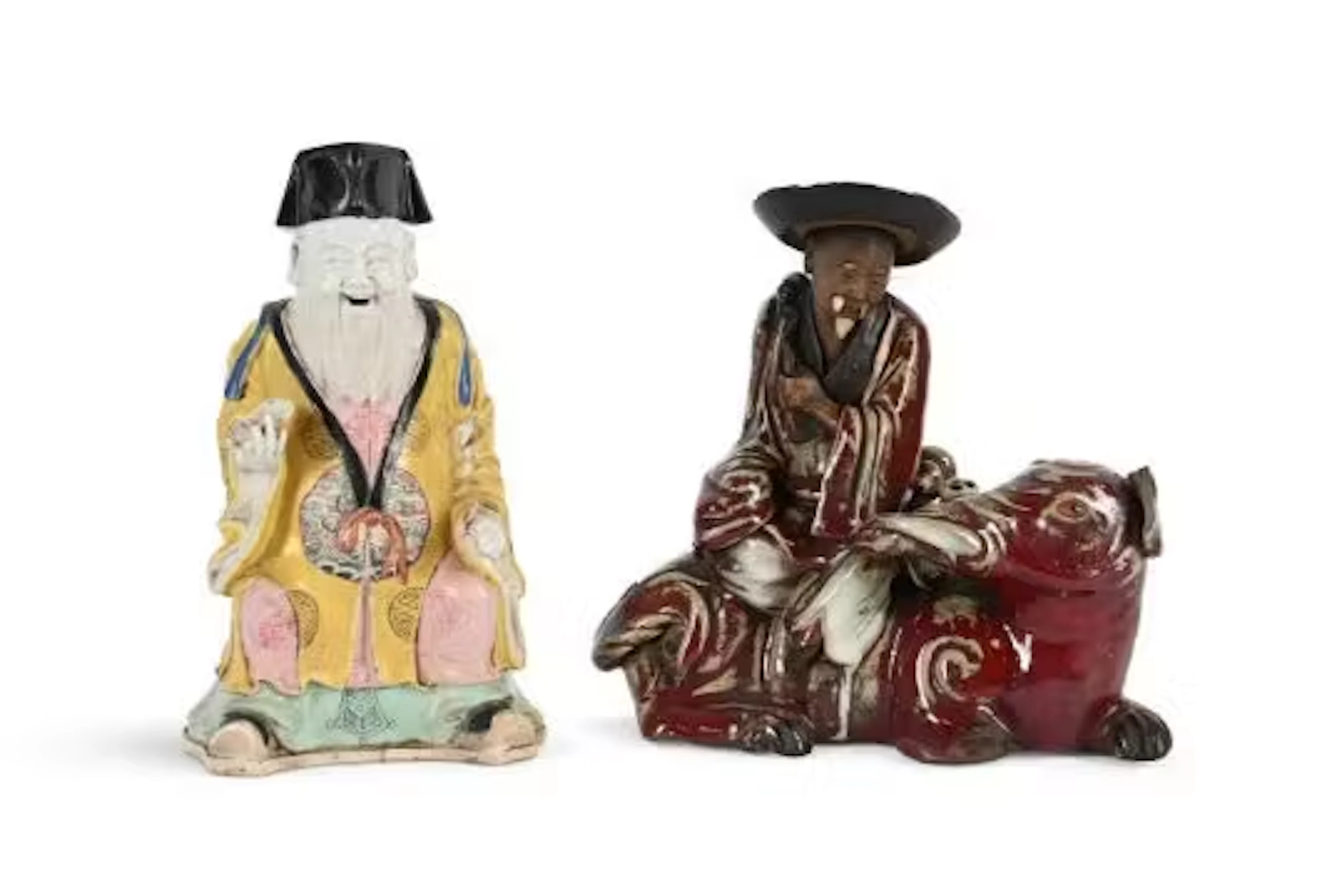A Chinese Famille Rose seated figure of Daoist deity