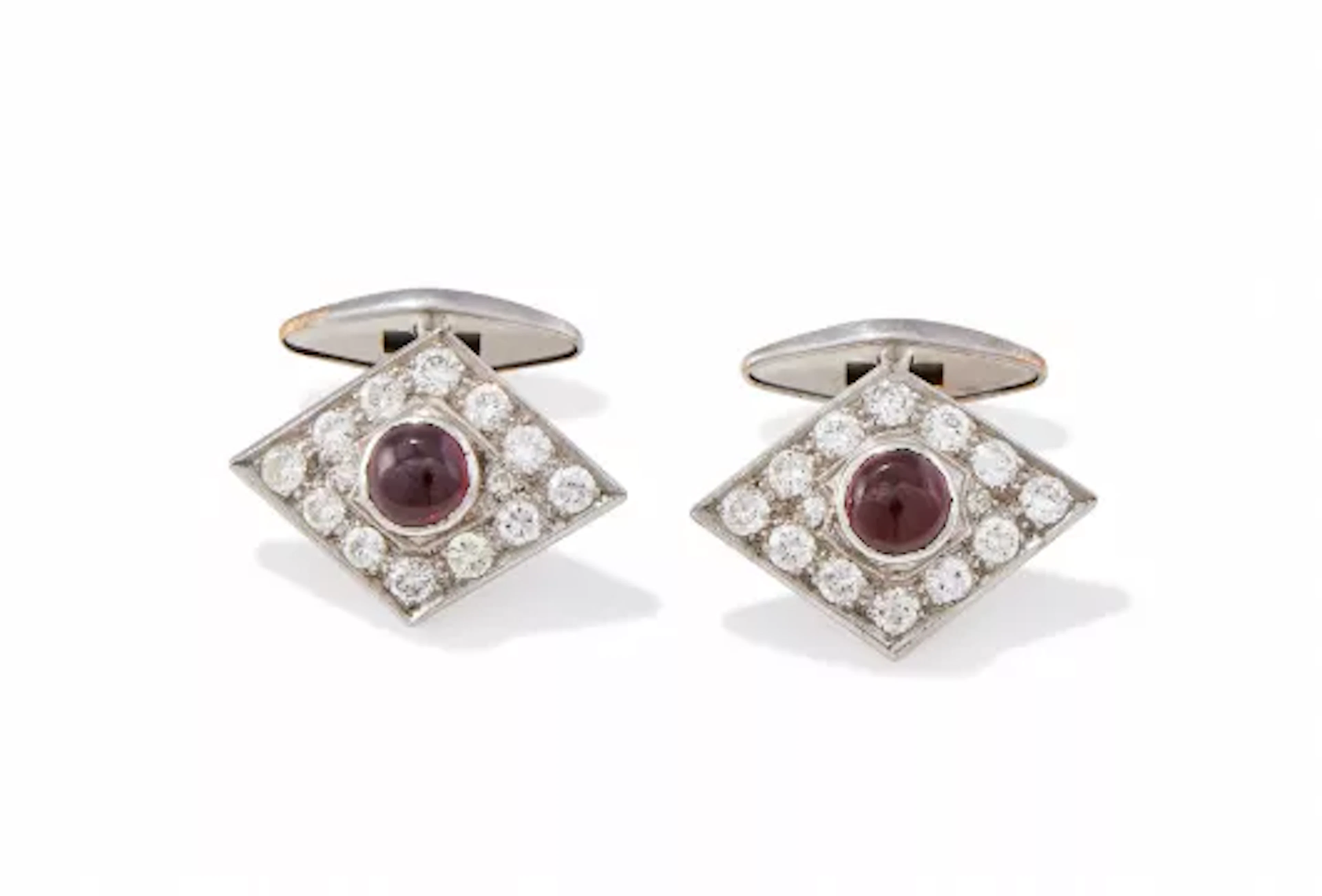 A PAIR OF GARNET AND DIAMOND CUFFLINKS
