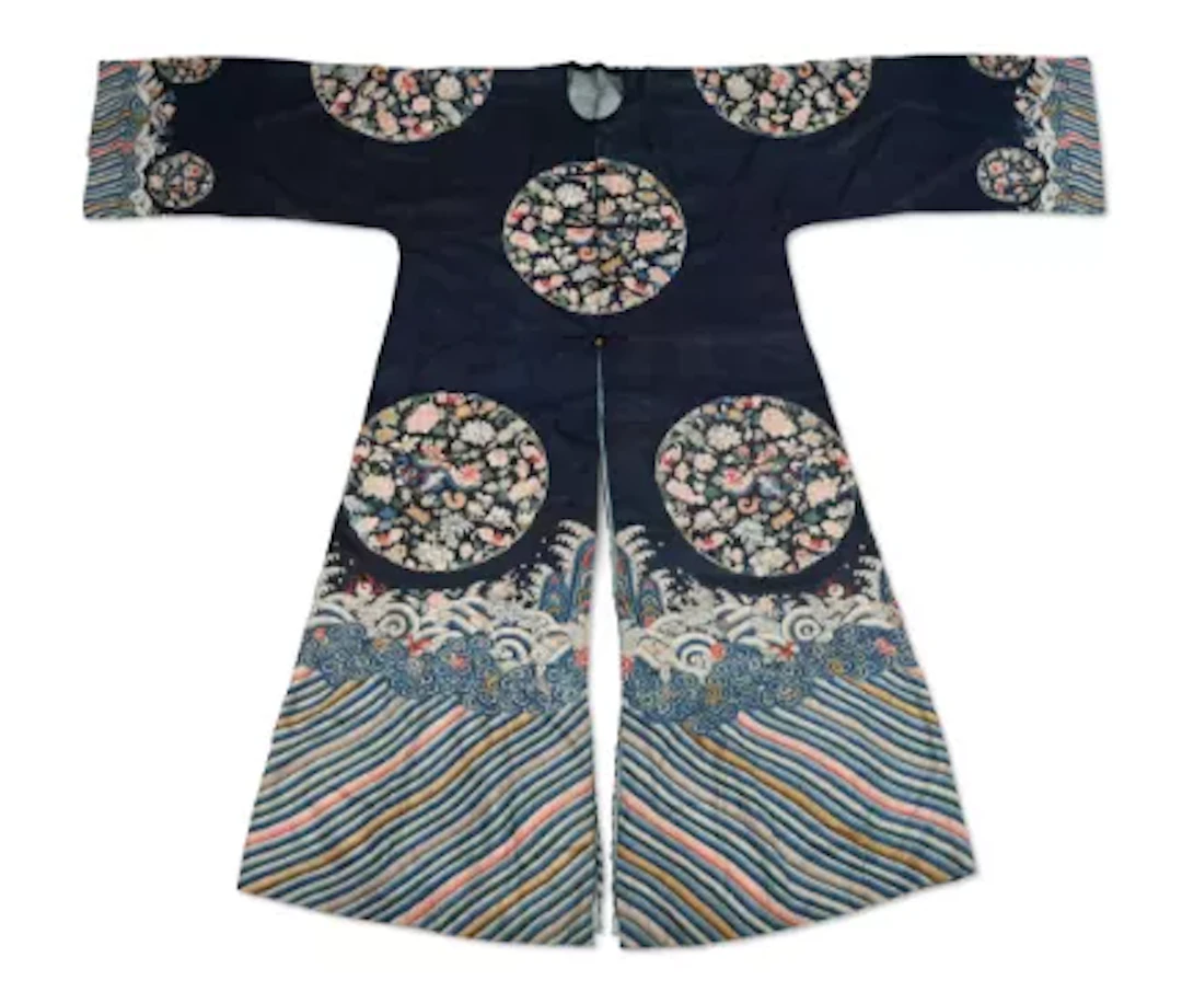 A Chinese, Manchu women’s silk surcoat