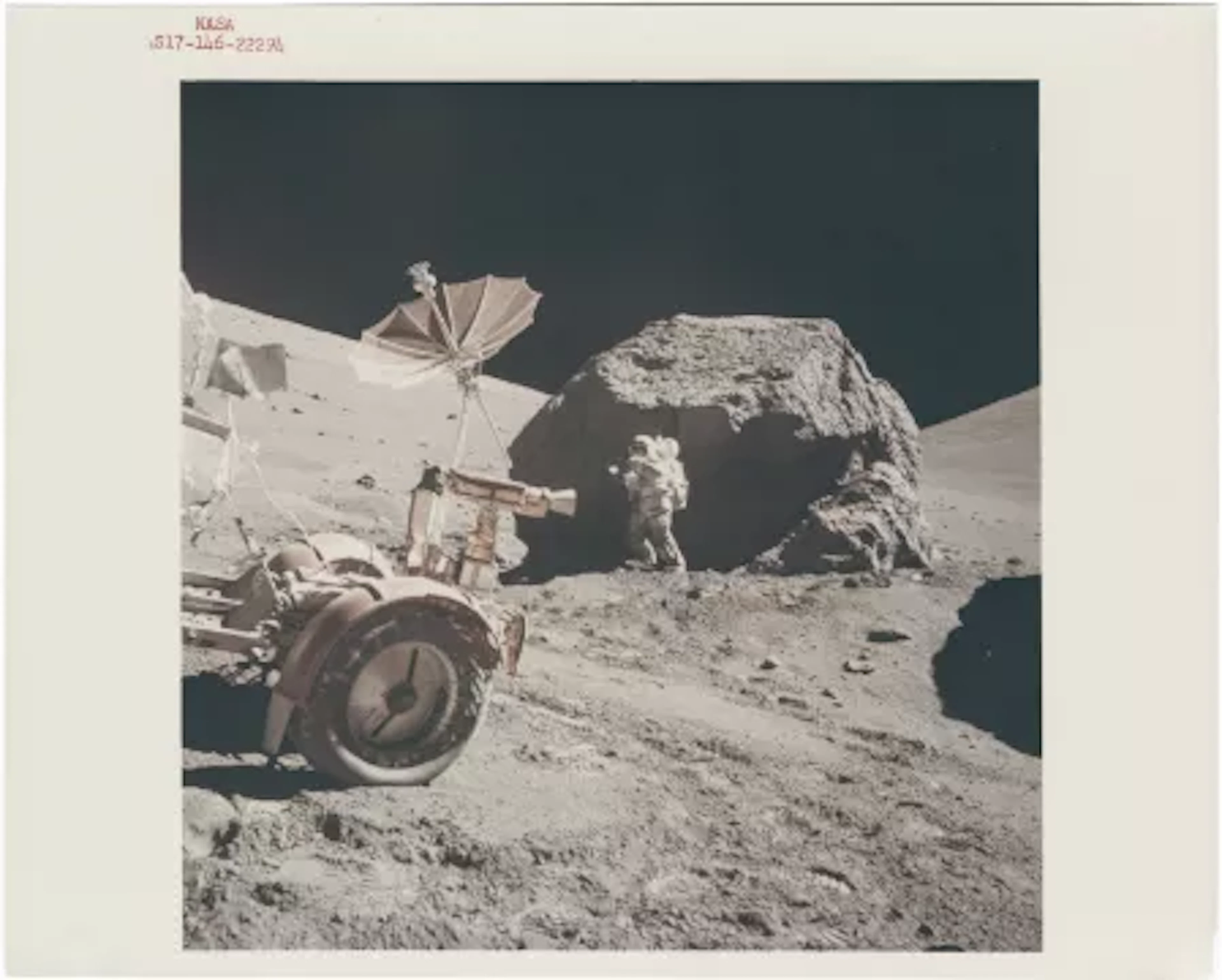 [Apollo 17] HARRISON SCHMITT TAKING PHOTOGRAPHS AT TRACY’S ROCK BEYOND