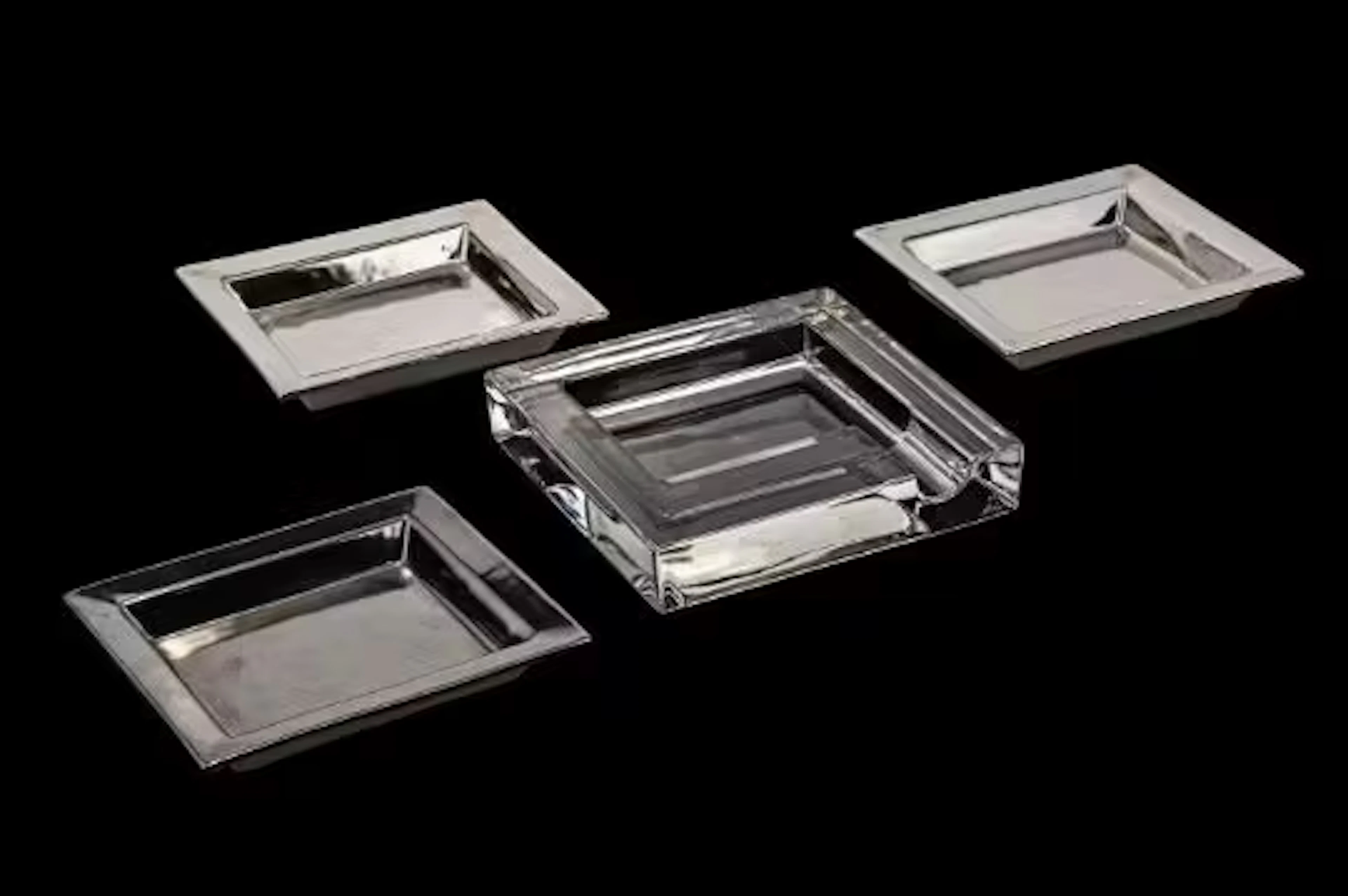 THREE SILVERED PORCELAIN VIDE POCHE TRAYS, BY LOUISE BRADLEY, TOGETHER