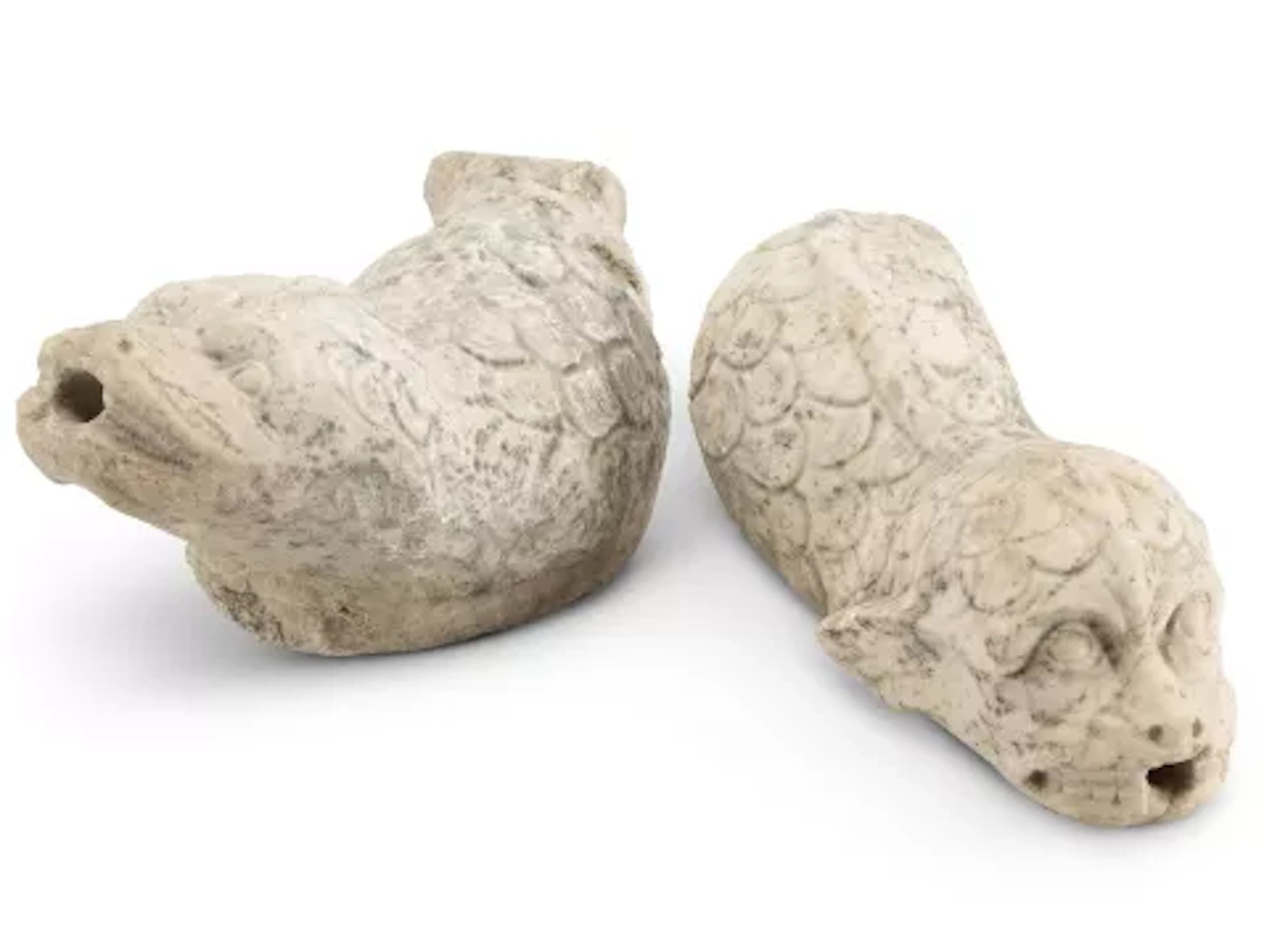 TWO MARBLE BEAST HEAD GARGOYLES, ITALIAN, 13TH/14TH CENTURY