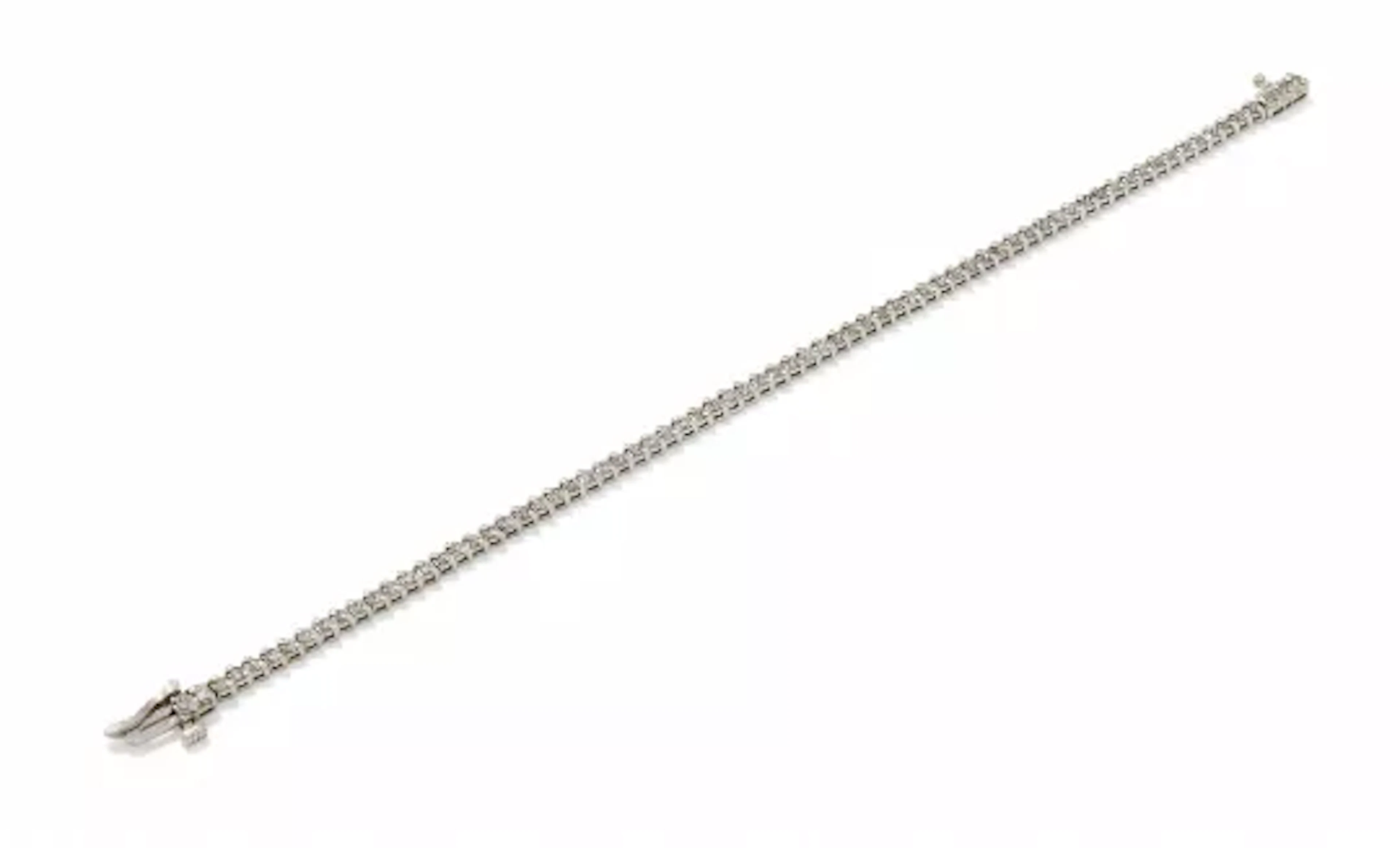 A DIAMOND TENNIS BRACELET