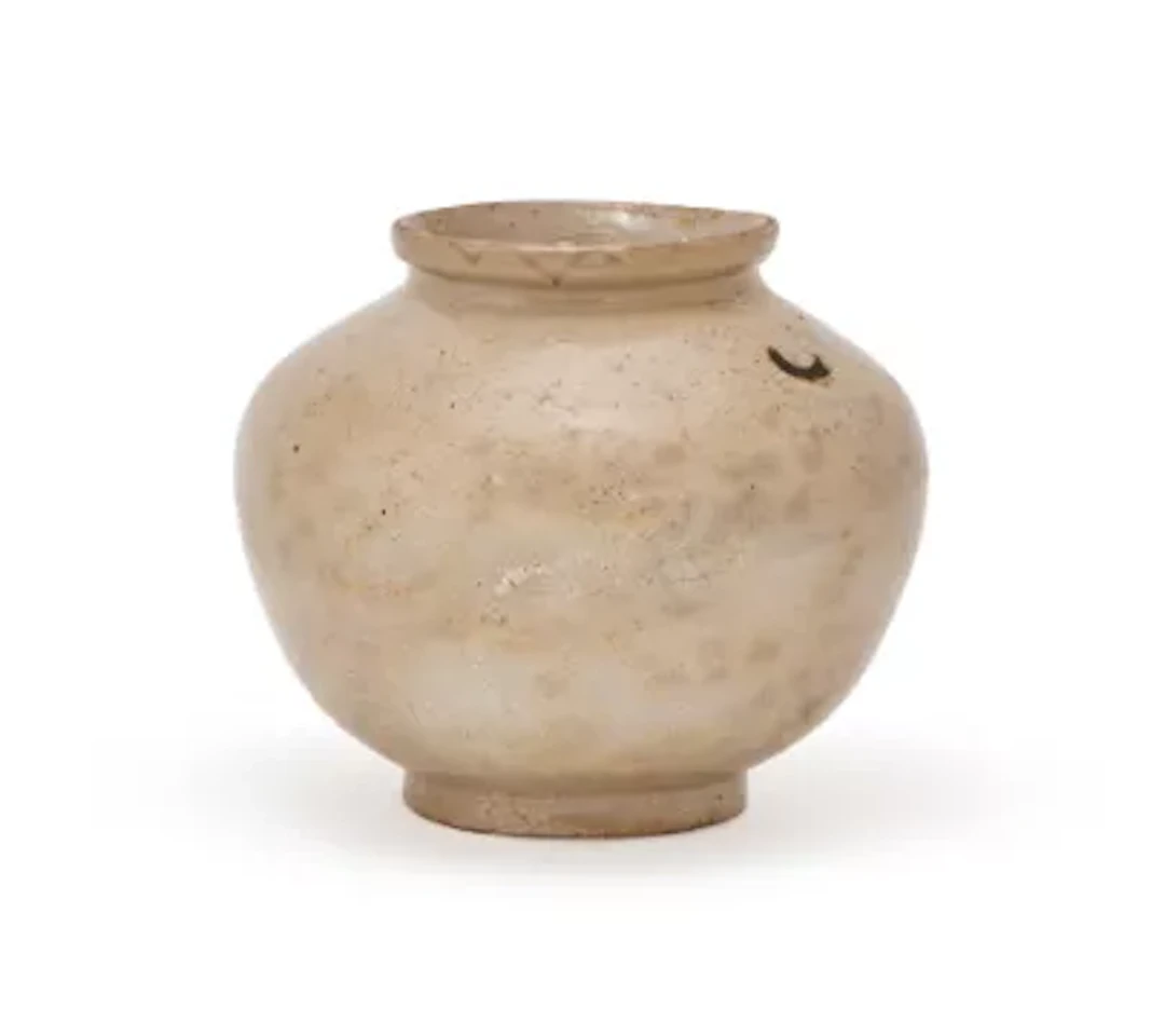 A Korean stoneware grey-white glazed jar, Joseon dynasty, 19th century