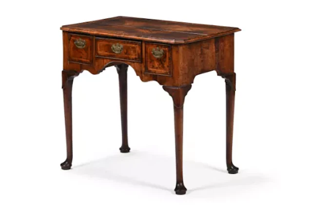 A GEORGE II WALNUT AND FEATHERBANDED SIDE TABLE OR LOWBOY, BY JOHN