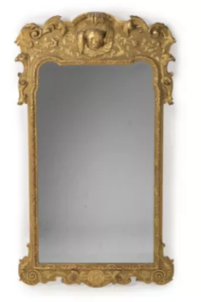 A CARVED GILTWOOD MIRROR, IN GEORGE I STYLE, SECOND HALF 19TH CENTURY