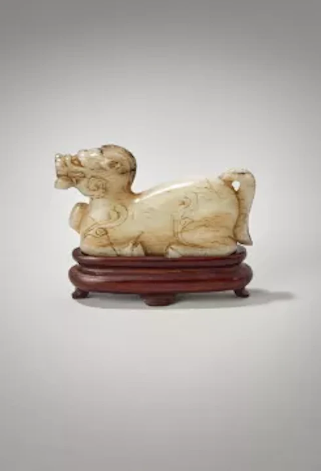 A Chinese white and grey jade carved mythical beast, tianma, Han Dynasty