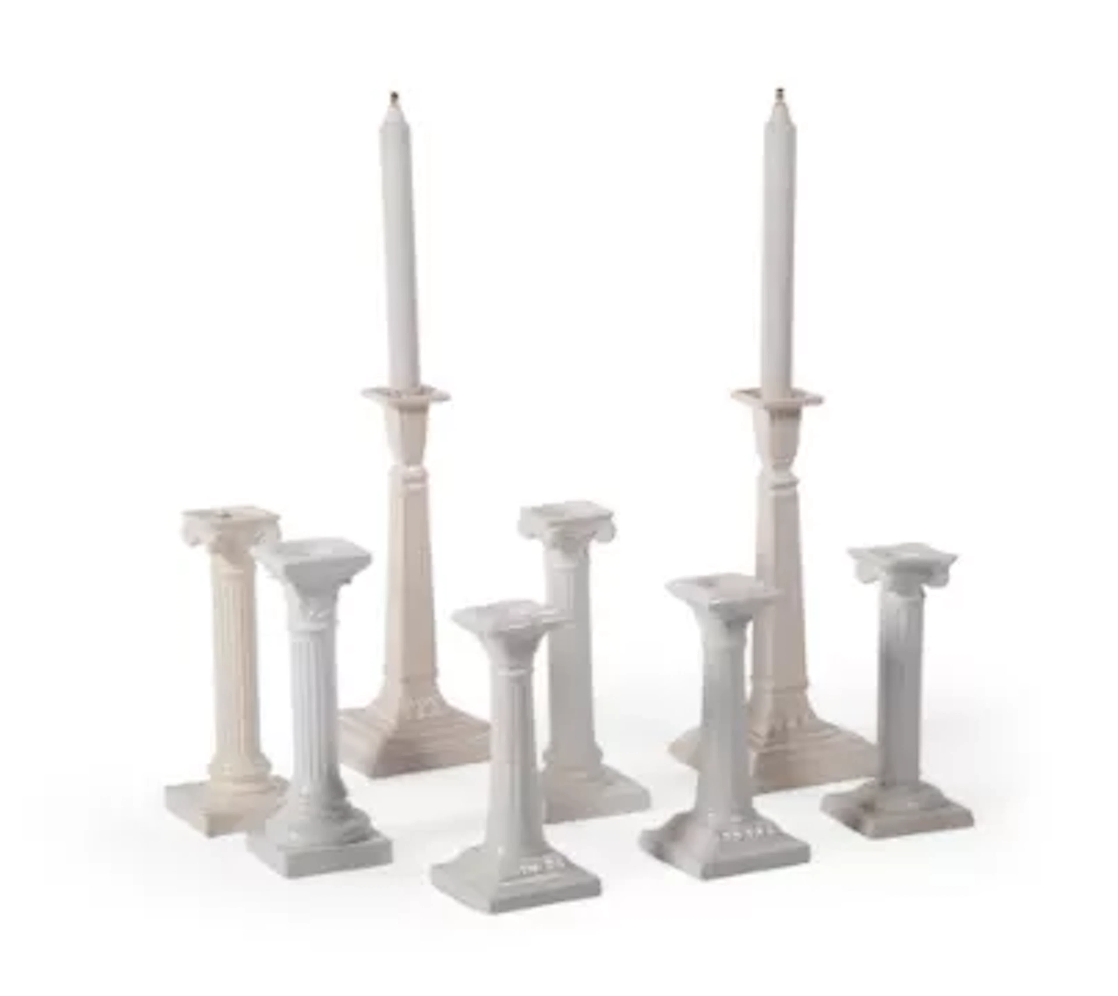 A PAIR OF ENGLISH CREAMWARE COLUMNAR CANDLESTICKS, LATE 20TH CENTURY