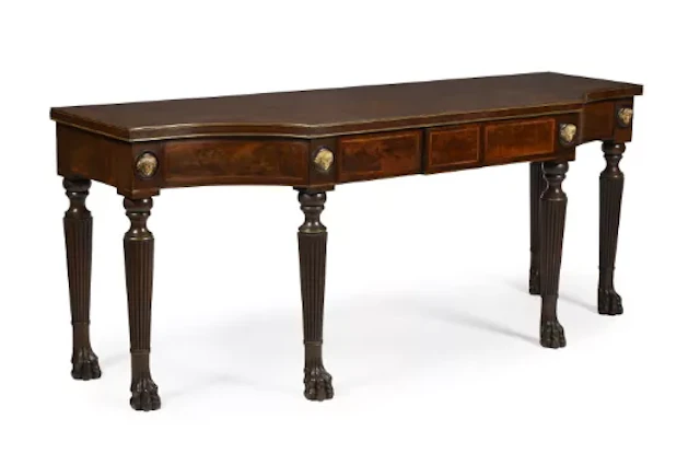 A REGENCY MAHOGANY, BRONZE AND BRASS MOUNTED BREAKFRONT SERVING OR