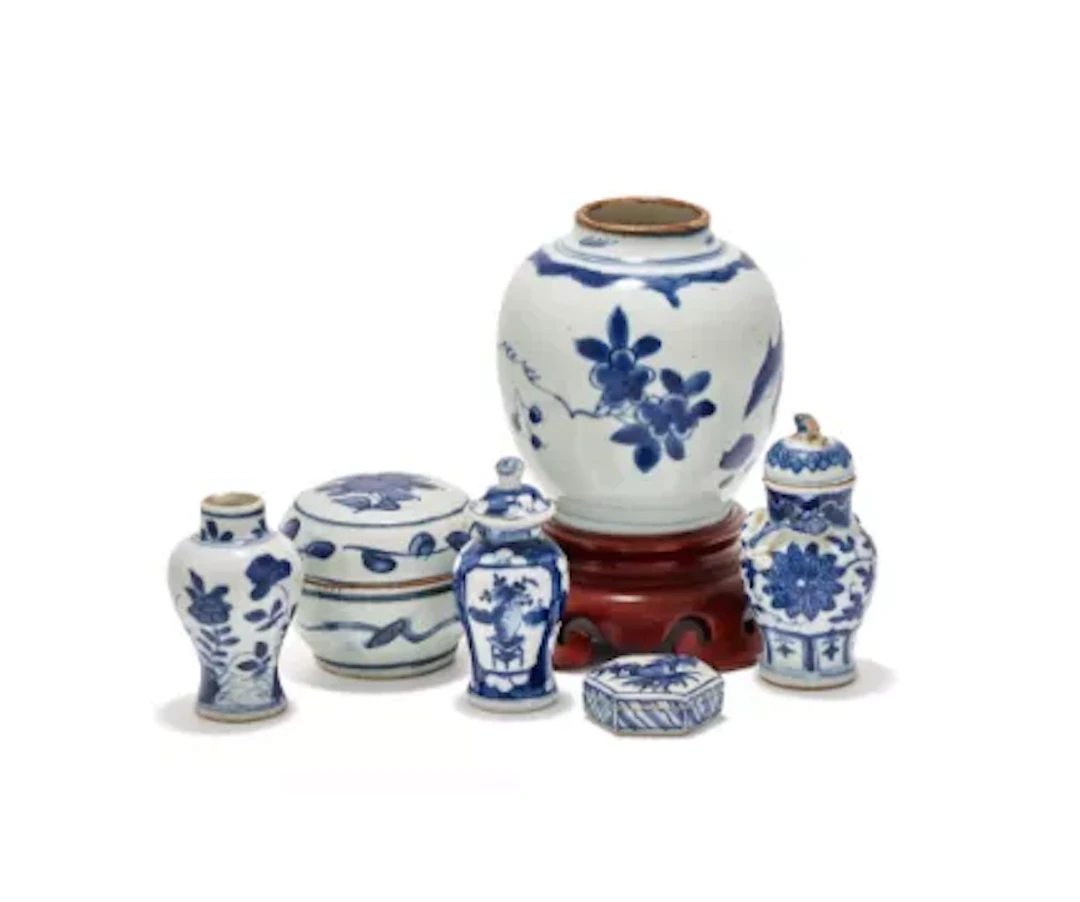 A group of six Chinese blue and white vases and box and cover