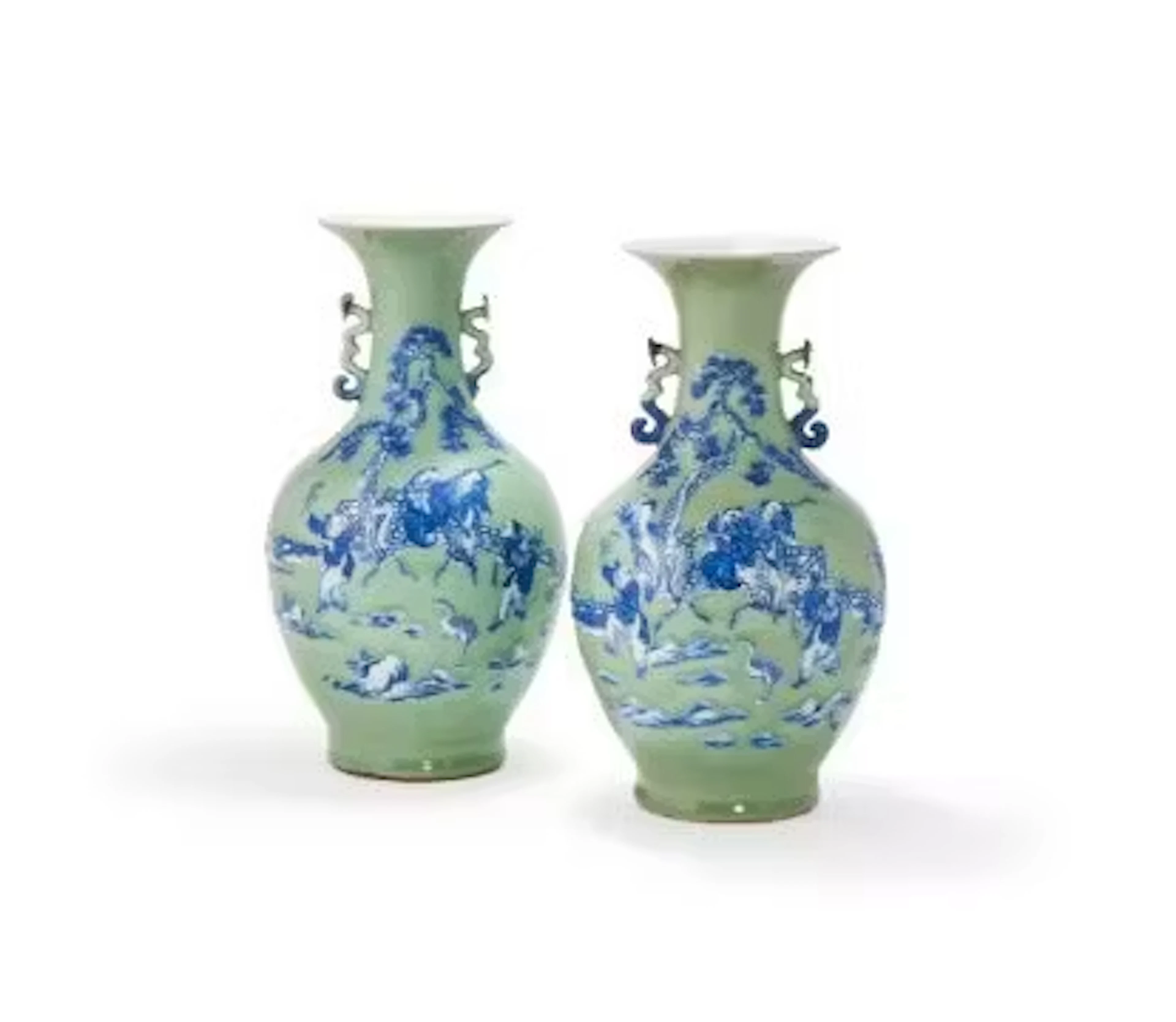 A pair of Chinese celadon-ground underglaze-blue decorated vases