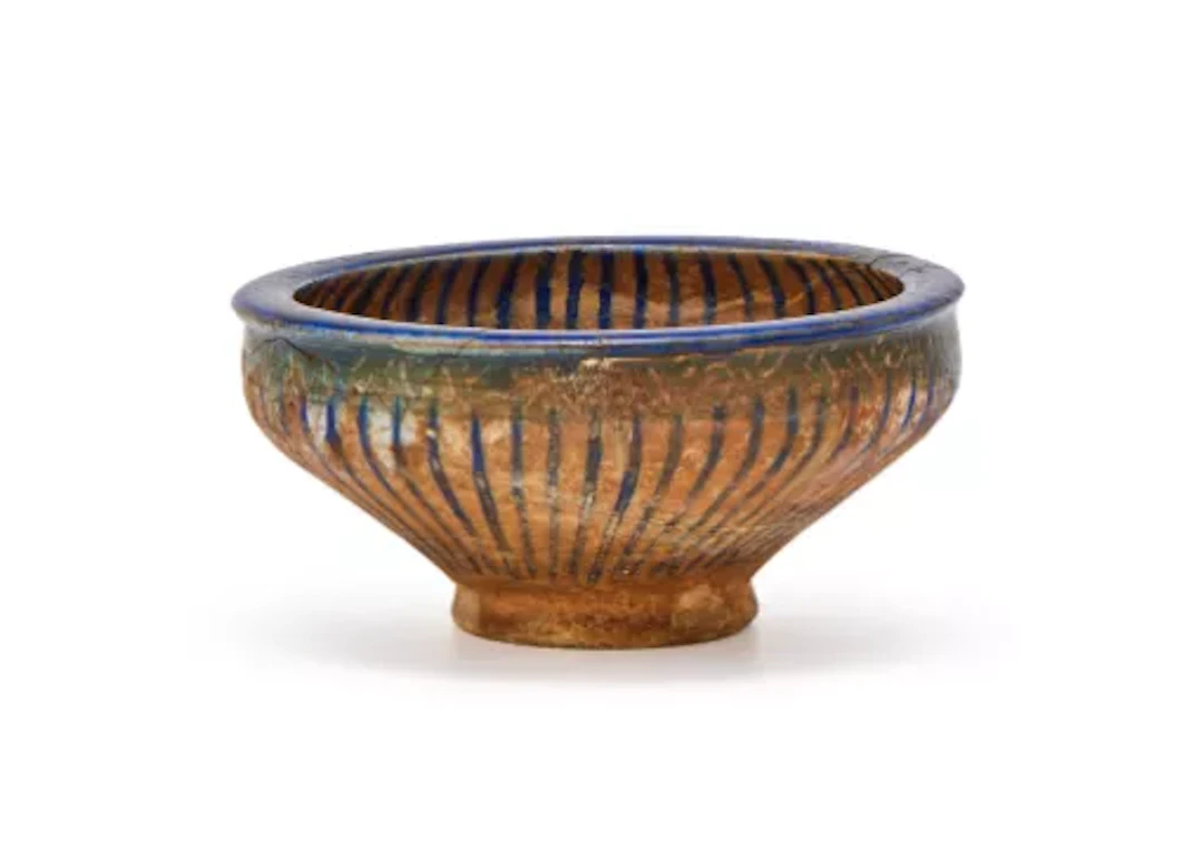 A Kashan fritware bowl, 13th century